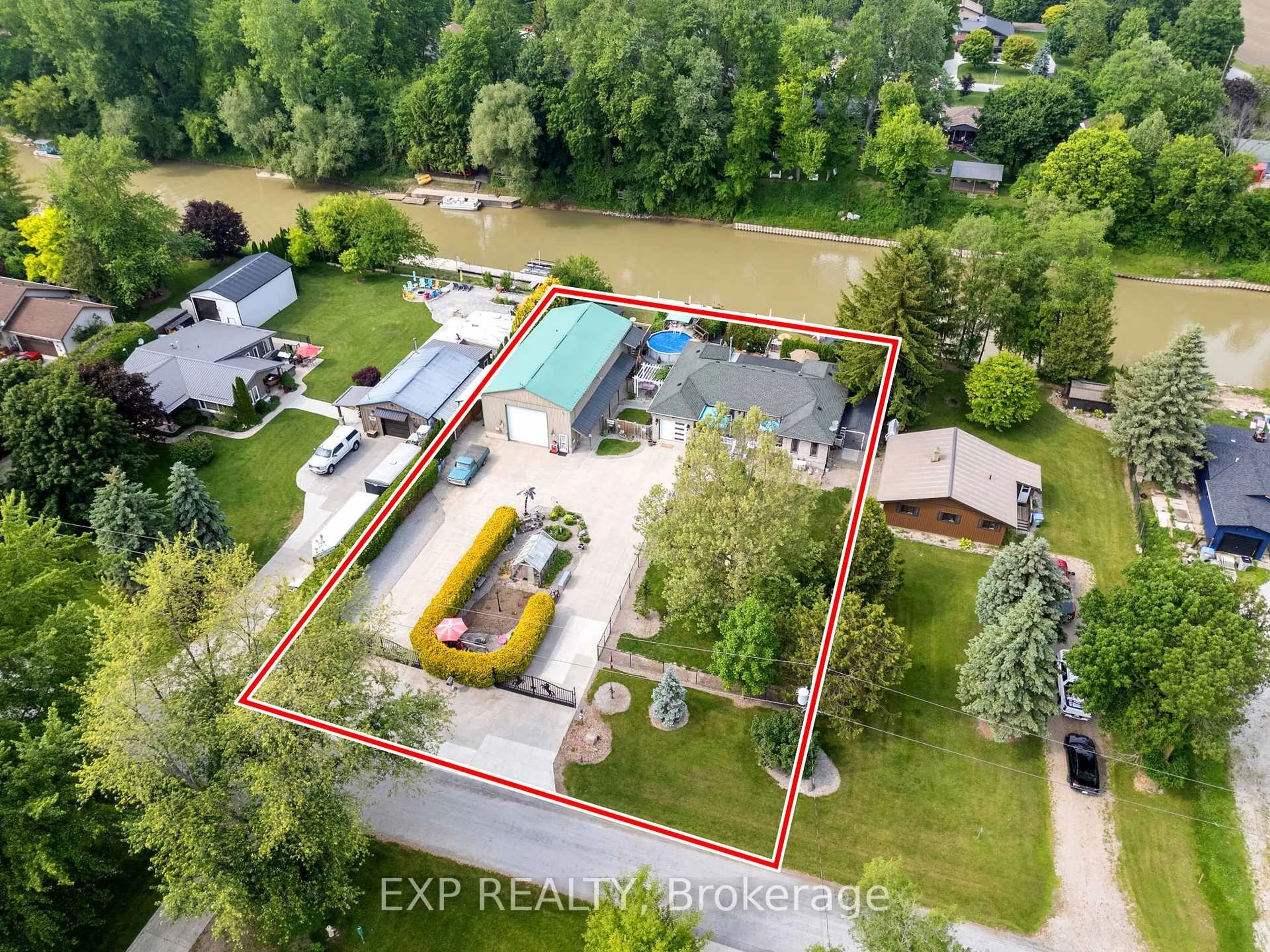 A pic from outside/outdoor area/front of a property/back of a property/a pic from drone, water/lake/river/ocean view for 8458 Lazy Lane, Lambton Shores Ontario N0M 2N0