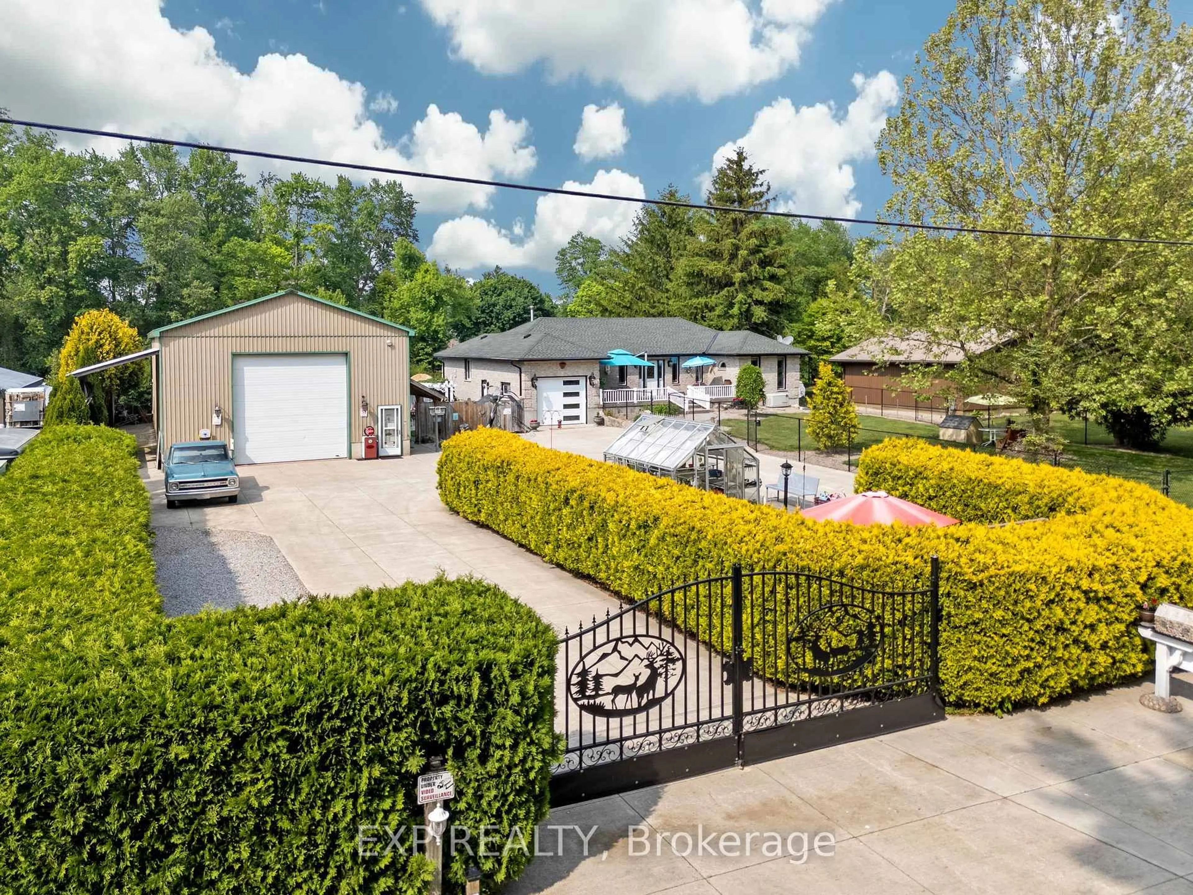 A pic from outside/outdoor area/front of a property/back of a property/a pic from drone, street for 8458 Lazy Lane, Lambton Shores Ontario N0M 2N0