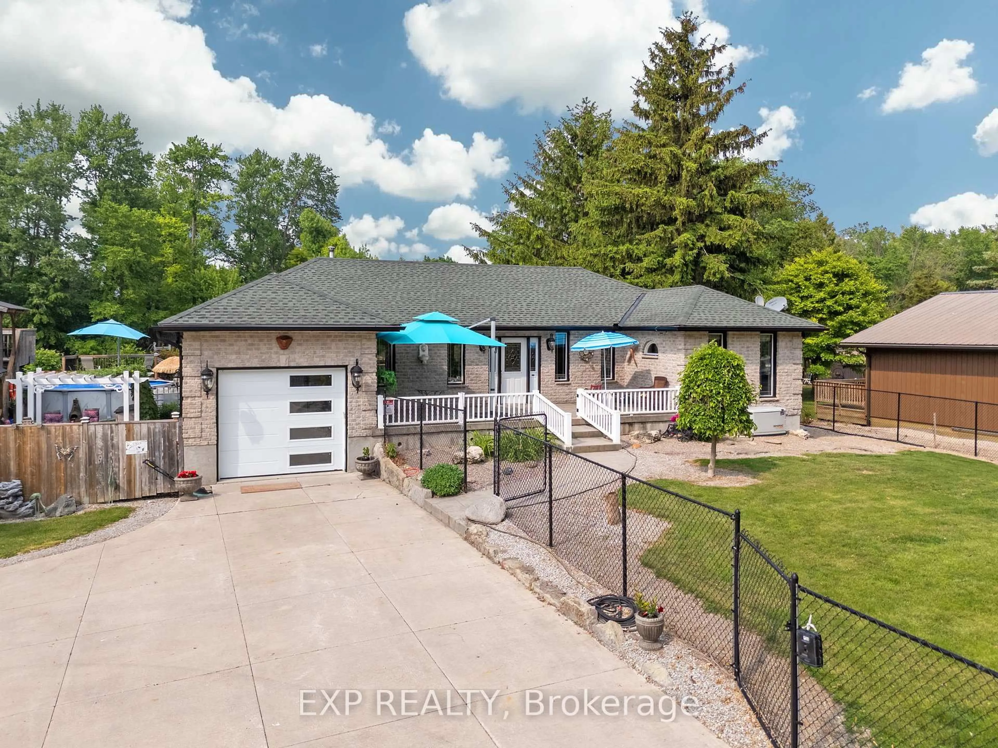 A pic from outside/outdoor area/front of a property/back of a property/a pic from drone, street for 8458 Lazy Lane, Lambton Shores Ontario N0M 2N0