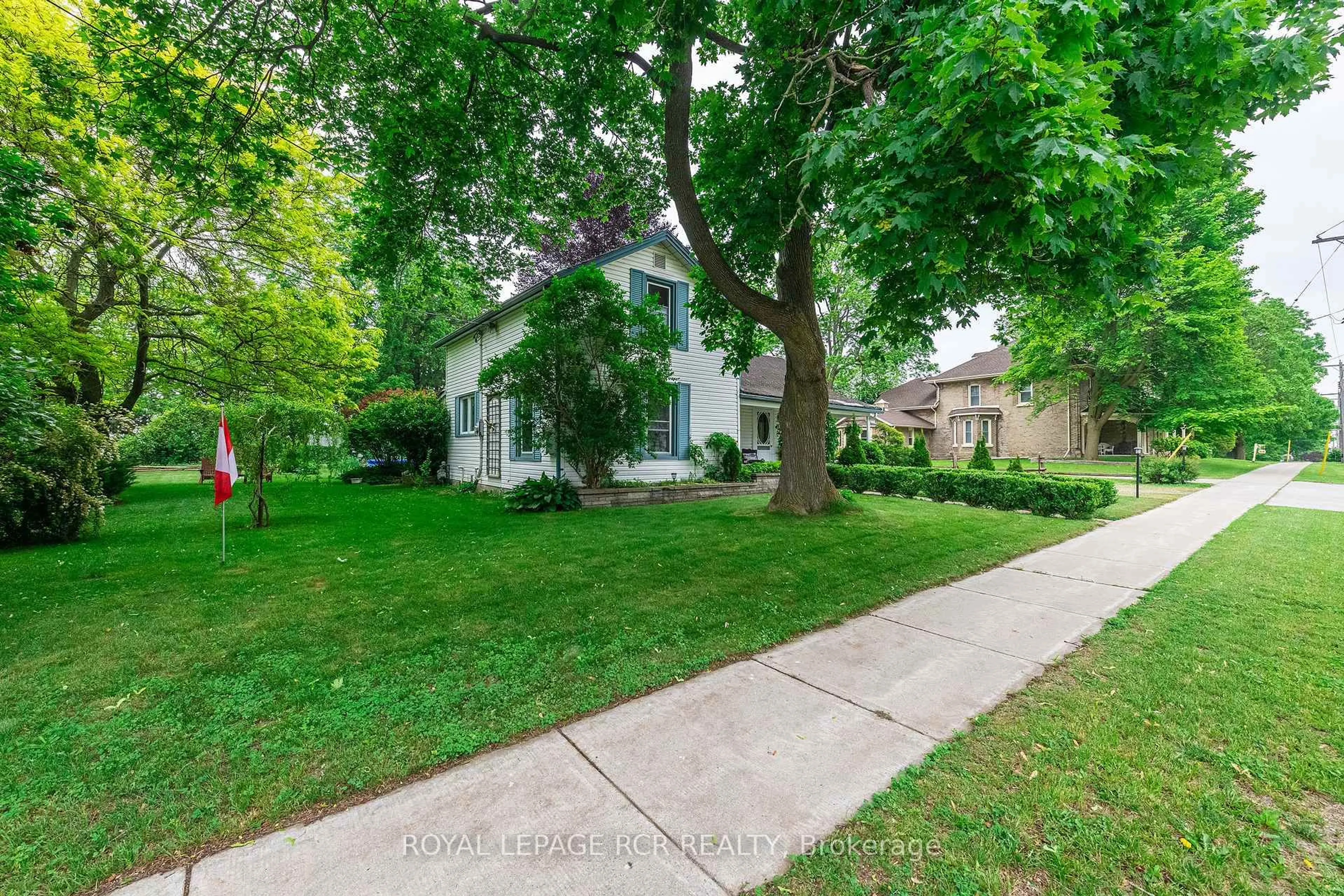 A pic from outside/outdoor area/front of a property/back of a property/a pic from drone, street for 96 Dundas St, Blandford-Blenheim Ontario N0J 1V0