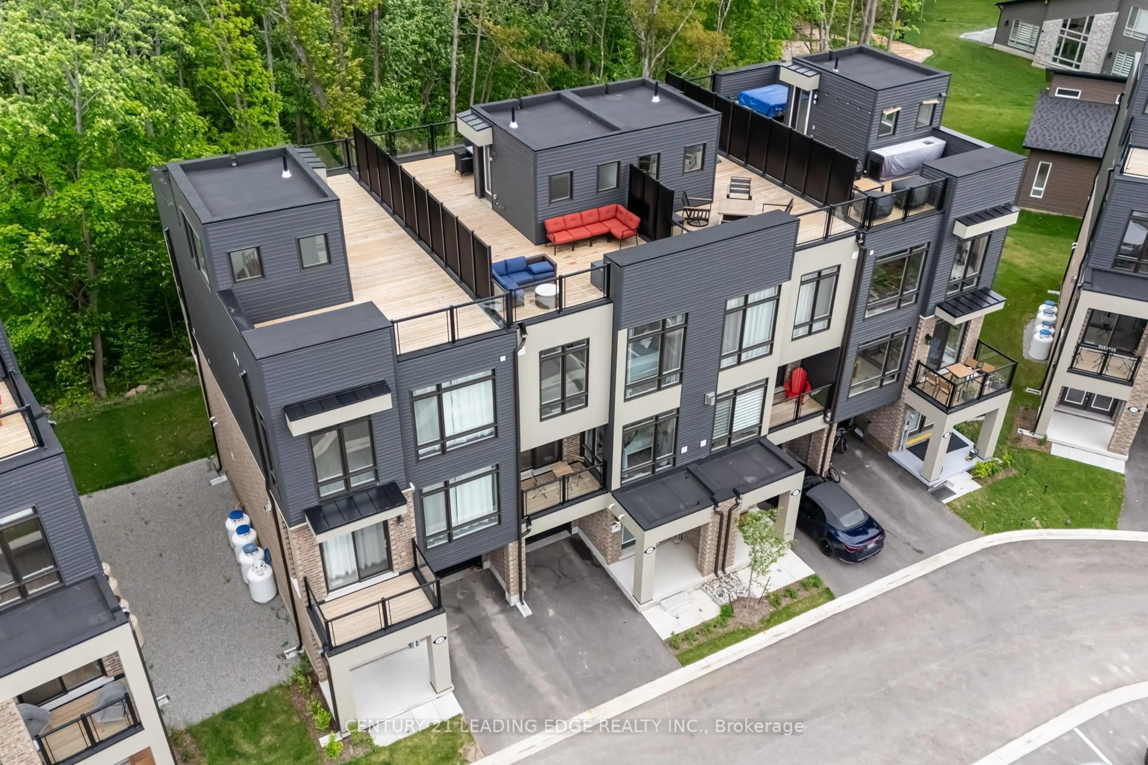 A pic from outside/outdoor area/front of a property/back of a property/a pic from drone, street for 105 Marina Village Dr, Georgian Bay Ontario L0K 1S0