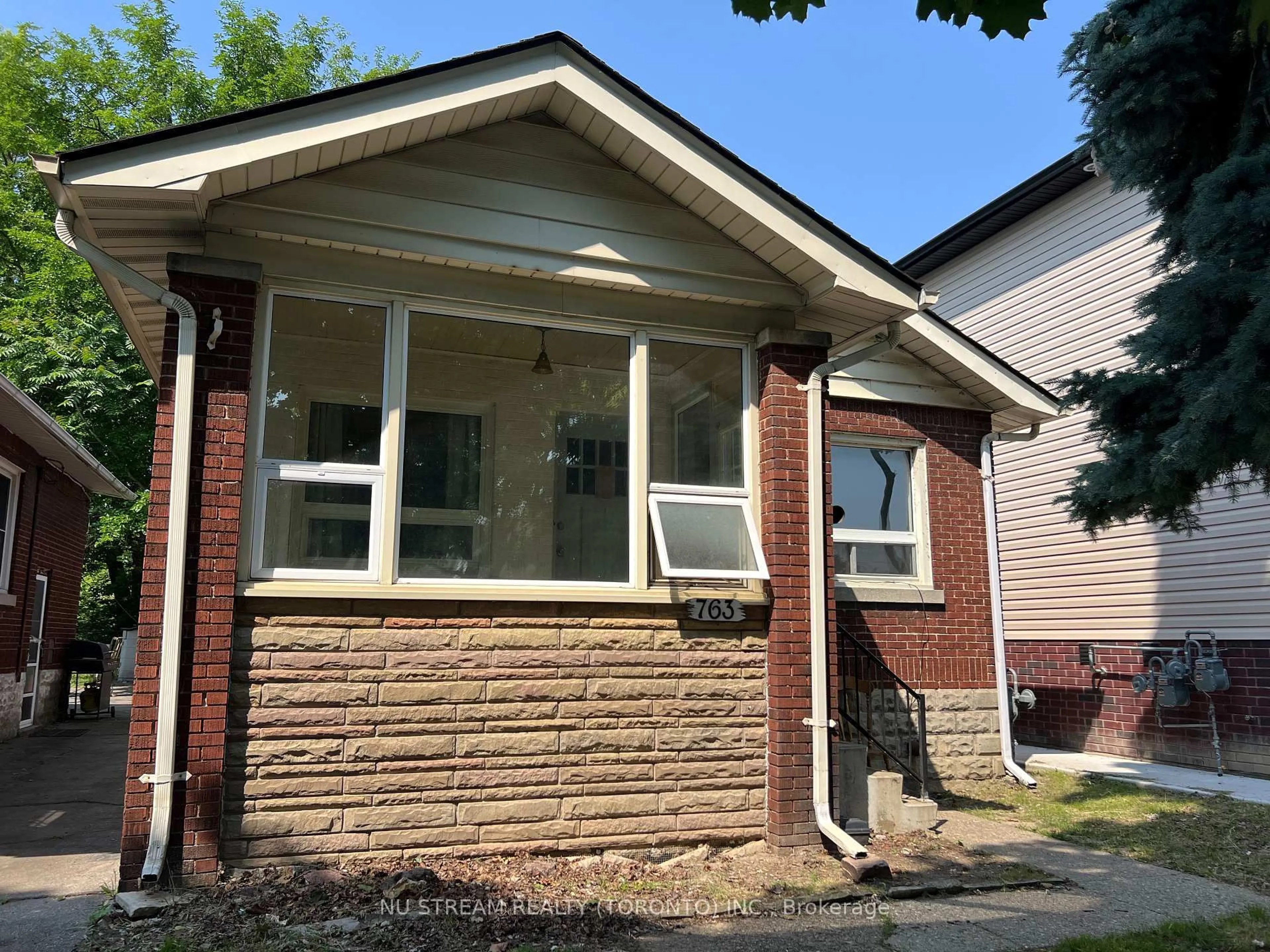 Home with brick exterior material, street for 763 Randolph Ave, Windsor Ontario N9B 2T7