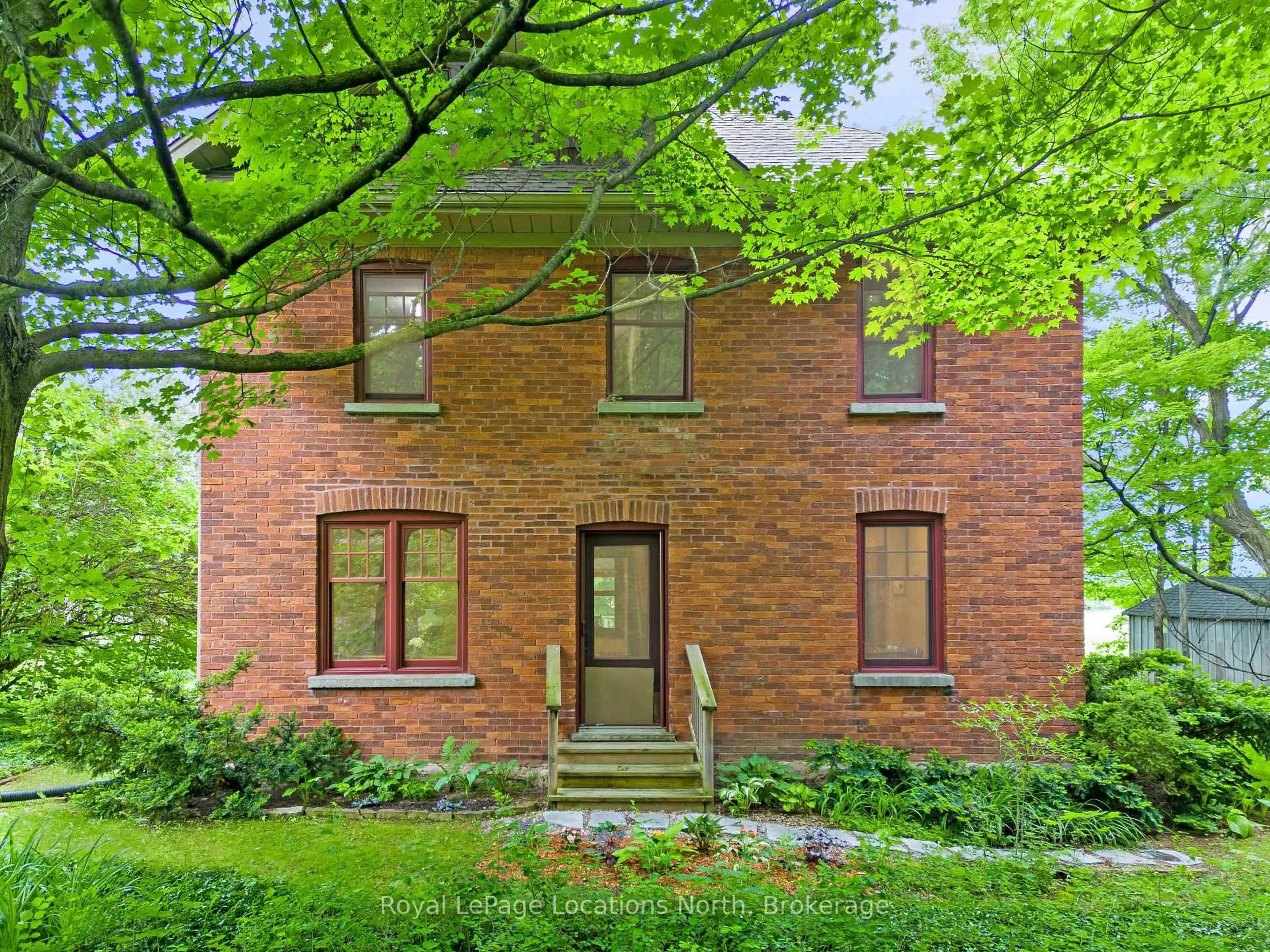 Home with brick exterior material, street for 077839 11TH Line, Meaford Ontario N4L 1W5