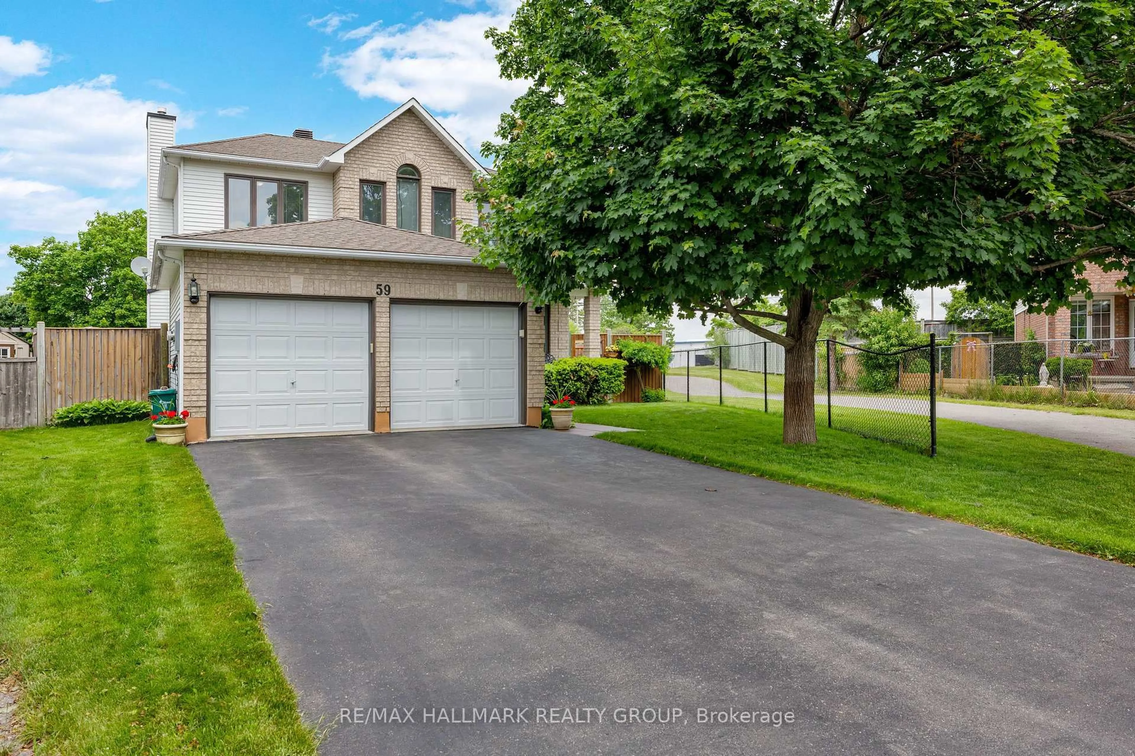 A pic from outside/outdoor area/front of a property/back of a property/a pic from drone, street for 59 Forestglade Cres, Ottawa Ontario K1G 5X4