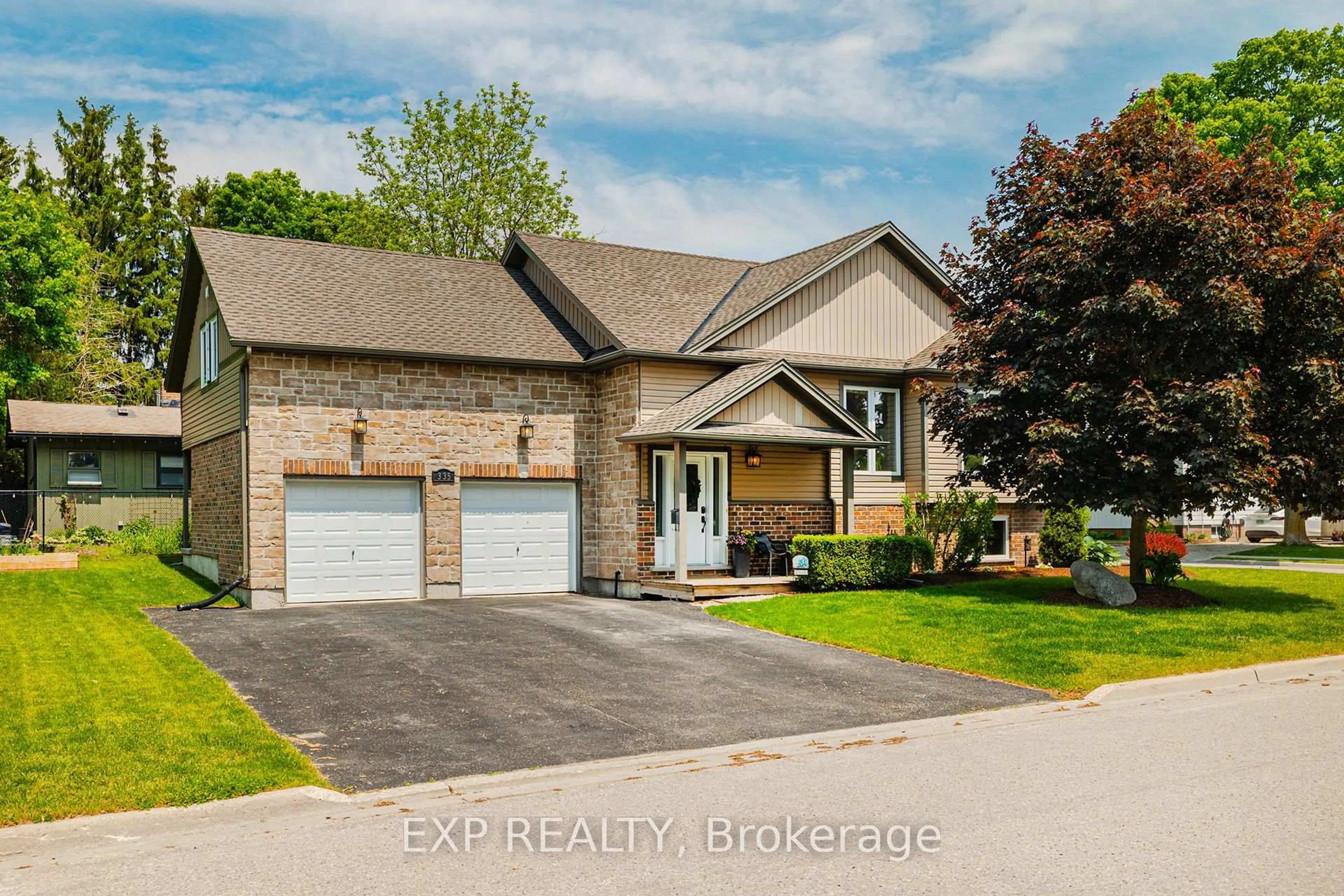 Home with brick exterior material, street for 335 John Rosa St, North Perth Ontario N4W 0E3
