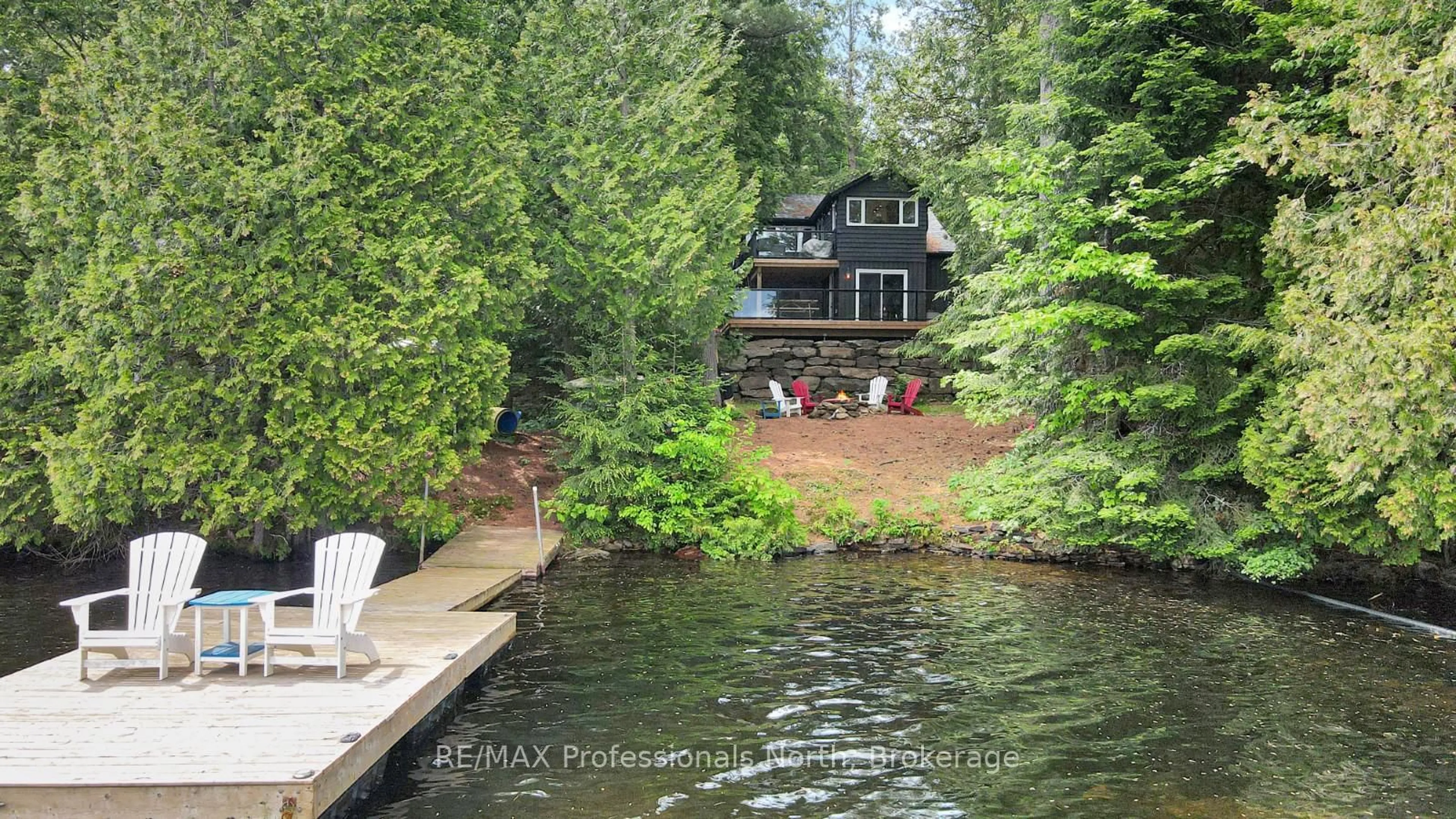 A pic from outside/outdoor area/front of a property/back of a property/a pic from drone, water/lake/river/ocean view for 1028 Coulson Lane, Highlands East Ontario K0M 1R0