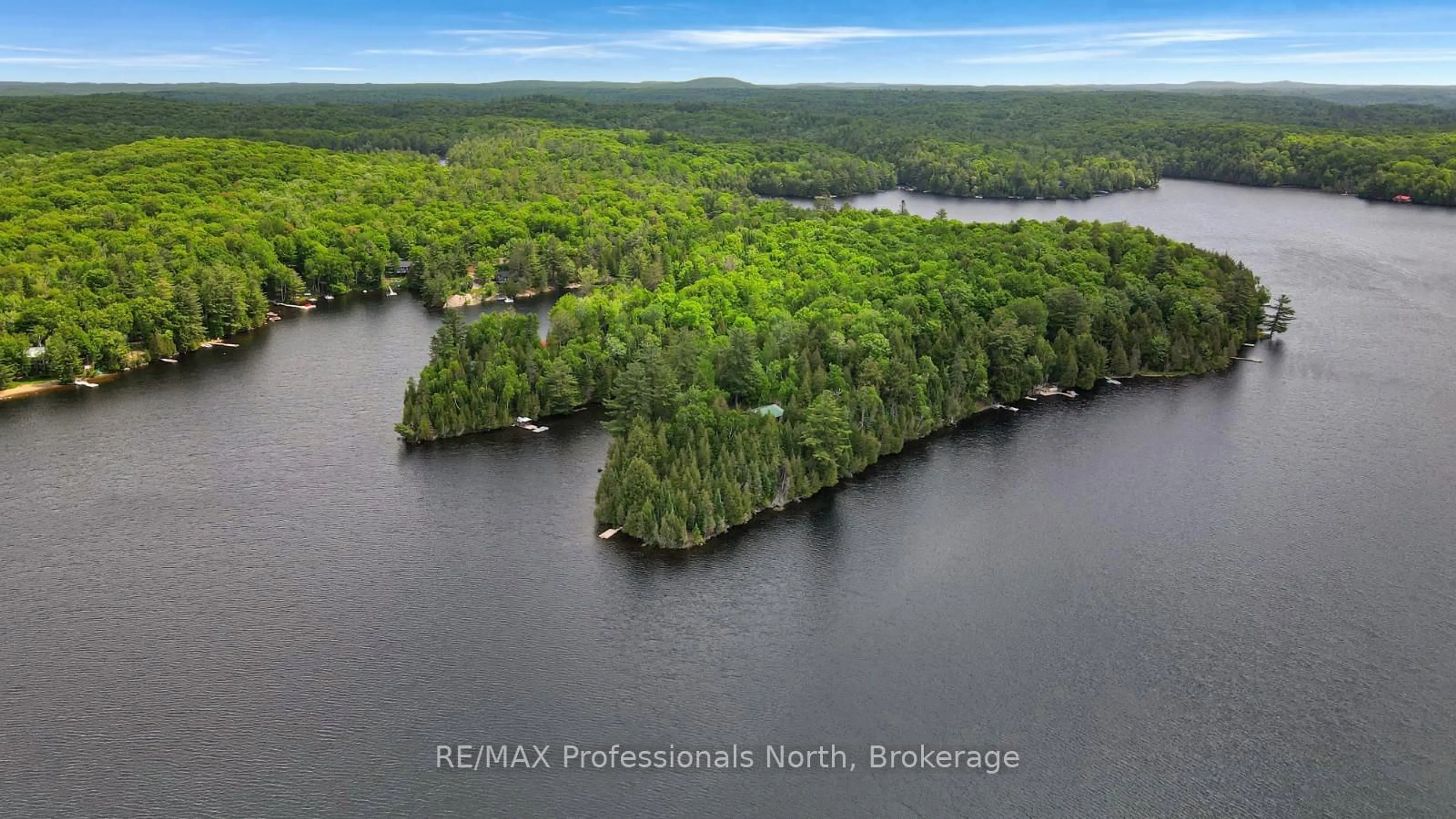 A pic from outside/outdoor area/front of a property/back of a property/a pic from drone, water/lake/river/ocean view for 1028 Coulson Lane, Highlands East Ontario K0M 1R0