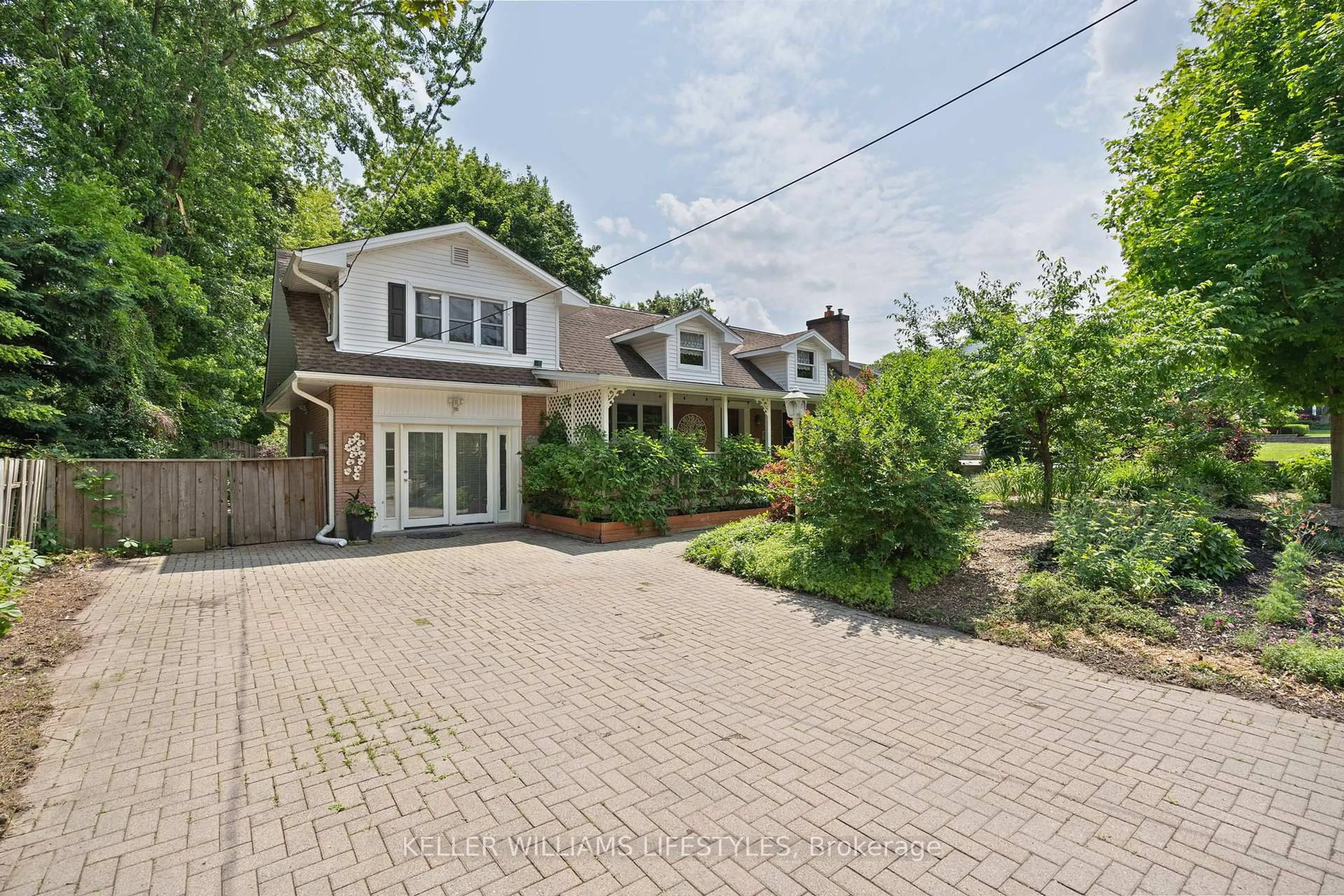 A pic from outside/outdoor area/front of a property/back of a property/a pic from drone, street for 1406 Byron Baseline Rd, London South Ontario N6K 2E8