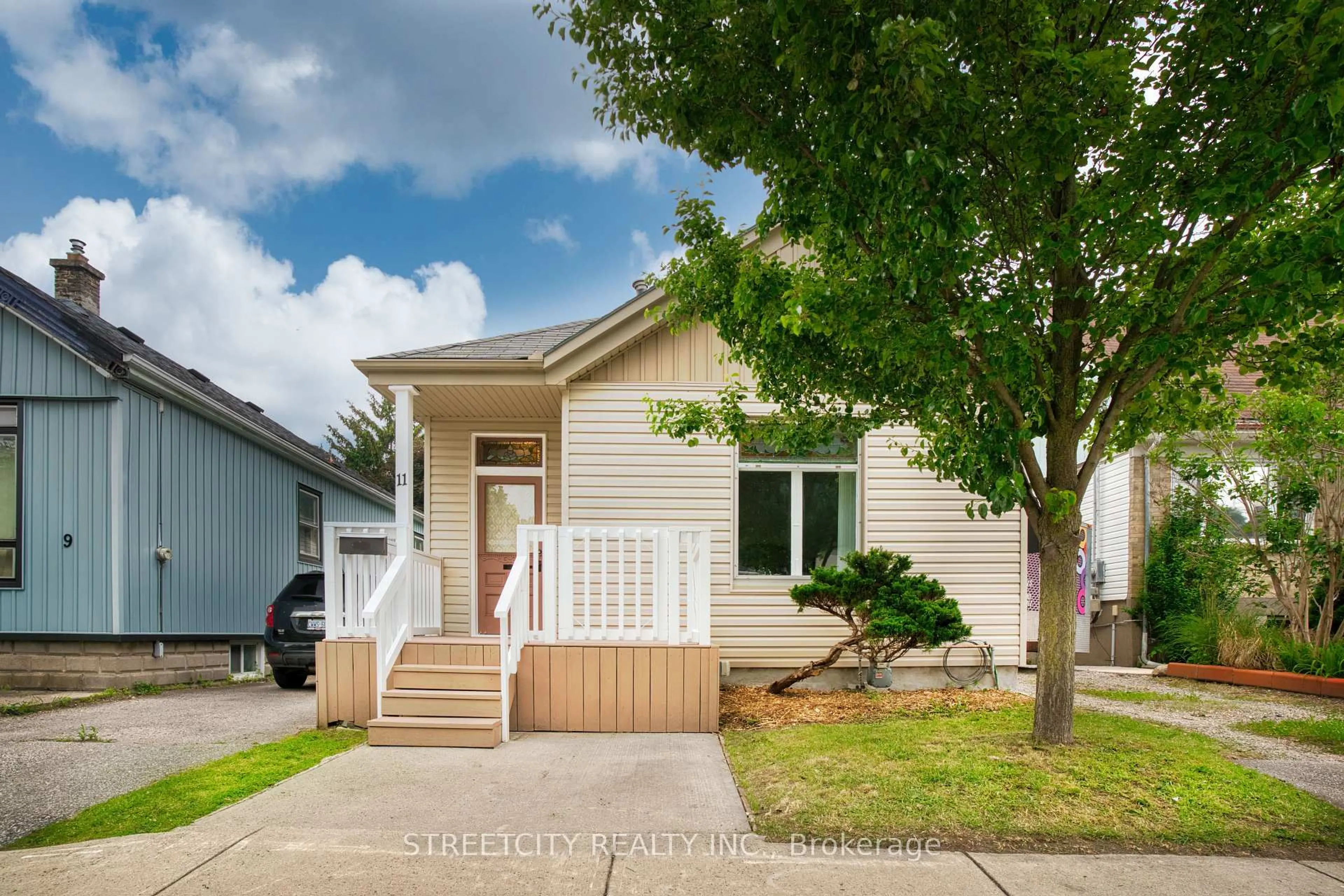 Home with vinyl exterior material, street for 11 Pegler St, London East Ontario N5Z 2B4