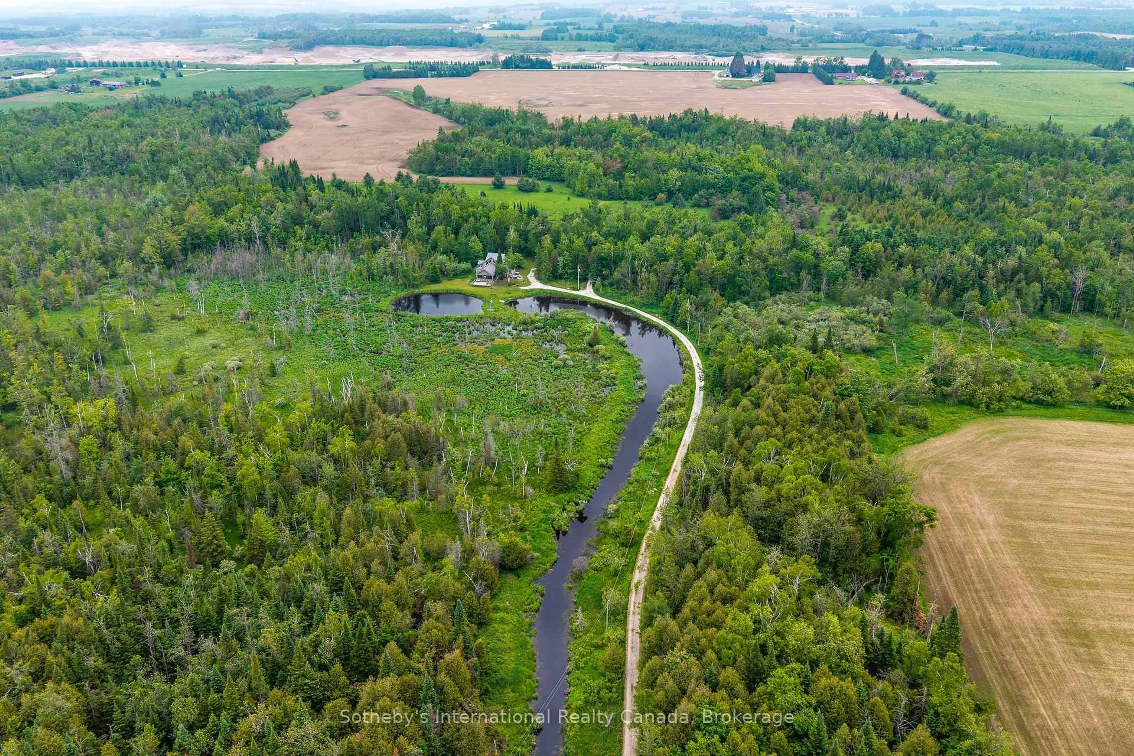 A pic from outside/outdoor area/front of a property/back of a property/a pic from drone, forest/trees view for 397061 5th Line, Melancthon Ontario L0N 1S9