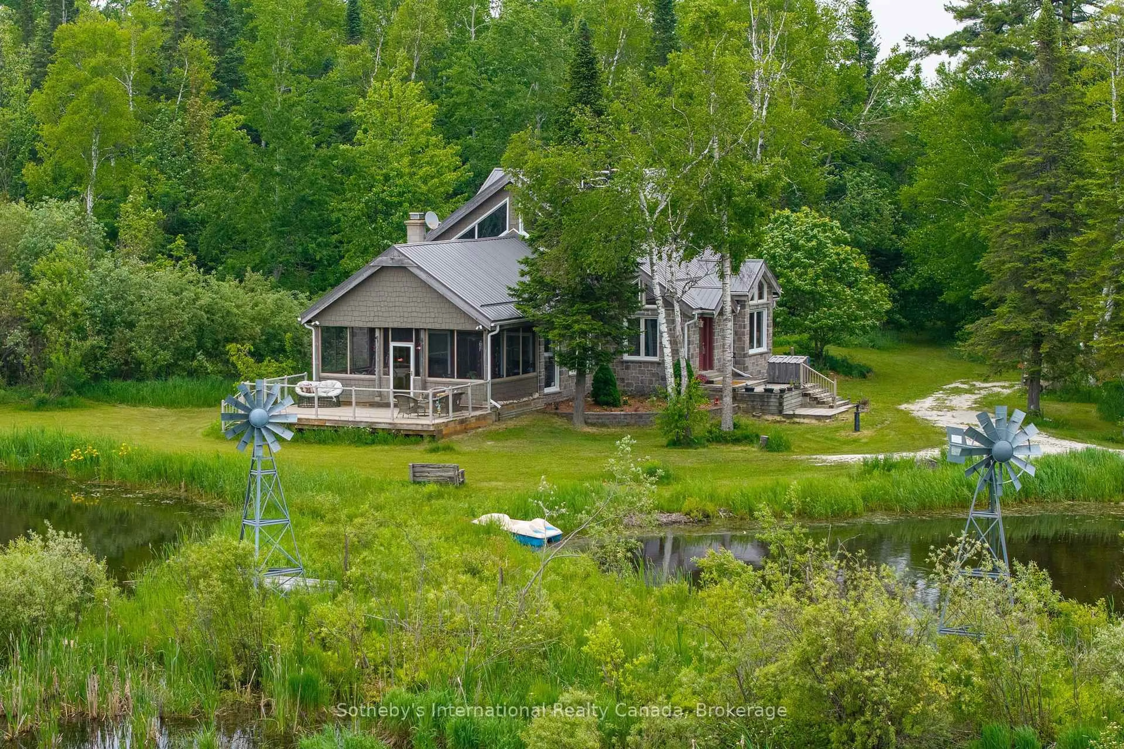 A pic from outside/outdoor area/front of a property/back of a property/a pic from drone, water/lake/river/ocean view for 397061 5th Line, Melancthon Ontario L0N 1S9