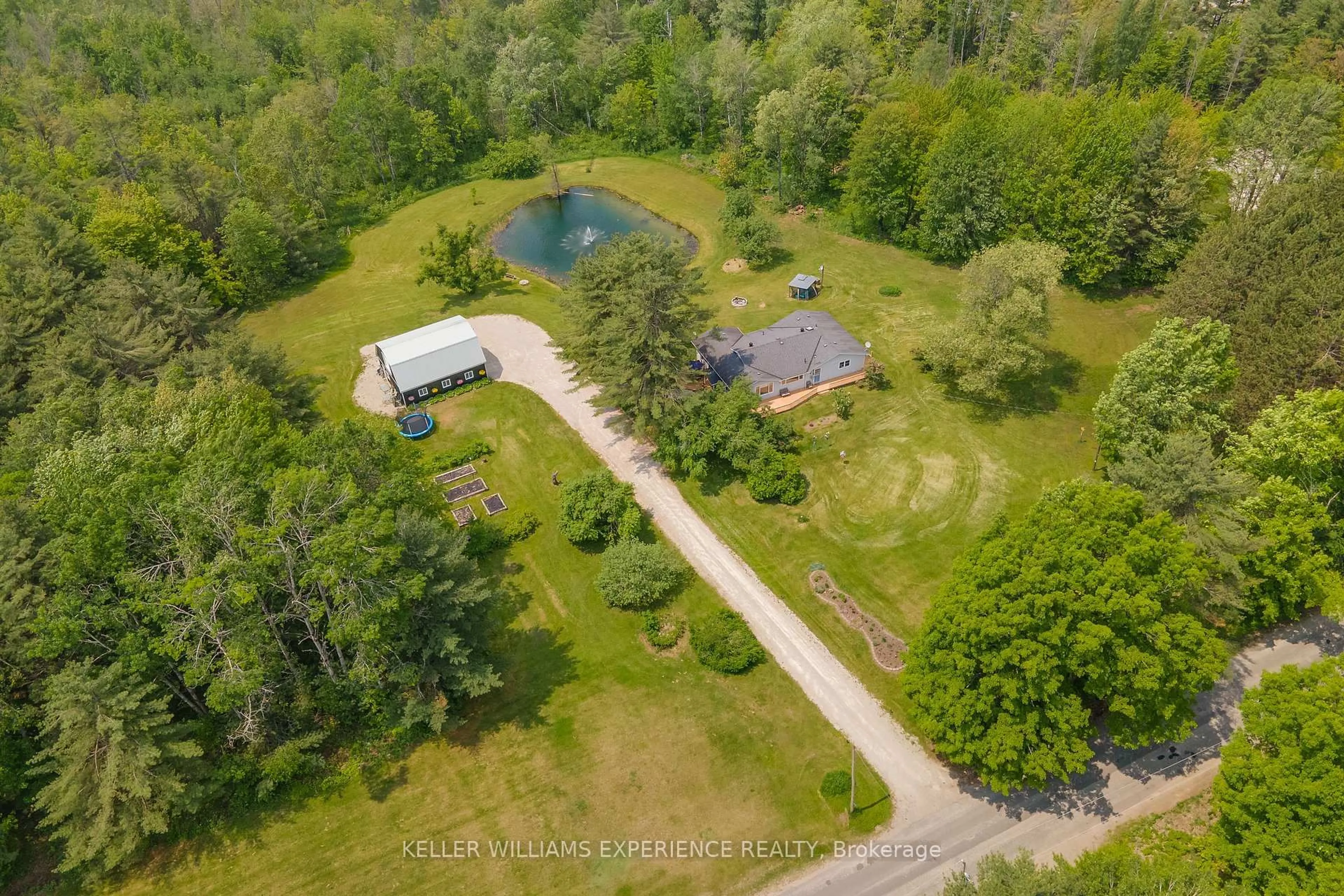 A pic from outside/outdoor area/front of a property/back of a property/a pic from drone, water/lake/river/ocean view for 1183 Baseline Rd, Gravenhurst Ontario P0E 1N0
