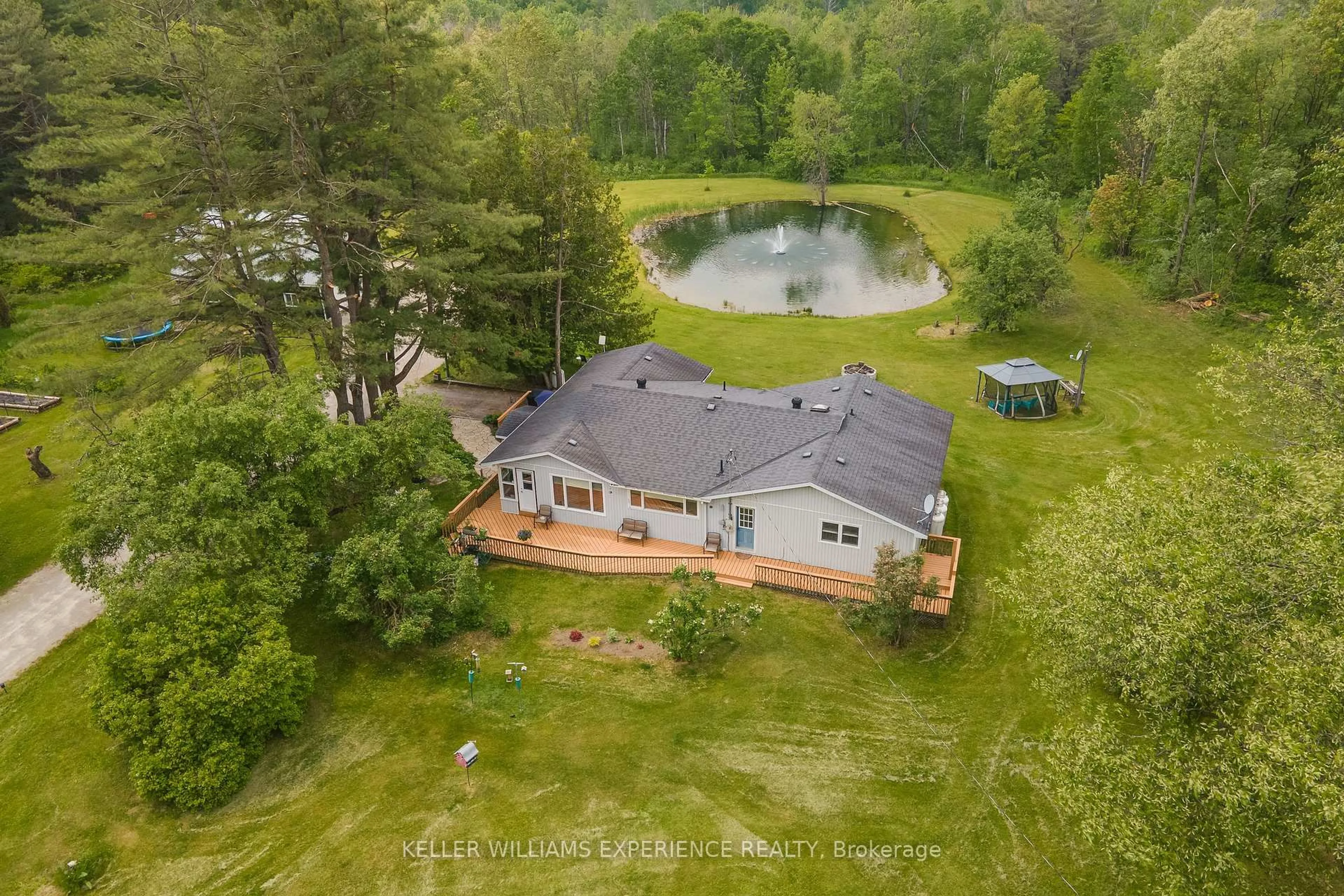 A pic from outside/outdoor area/front of a property/back of a property/a pic from drone, water/lake/river/ocean view for 1183 Baseline Rd, Gravenhurst Ontario P0E 1N0