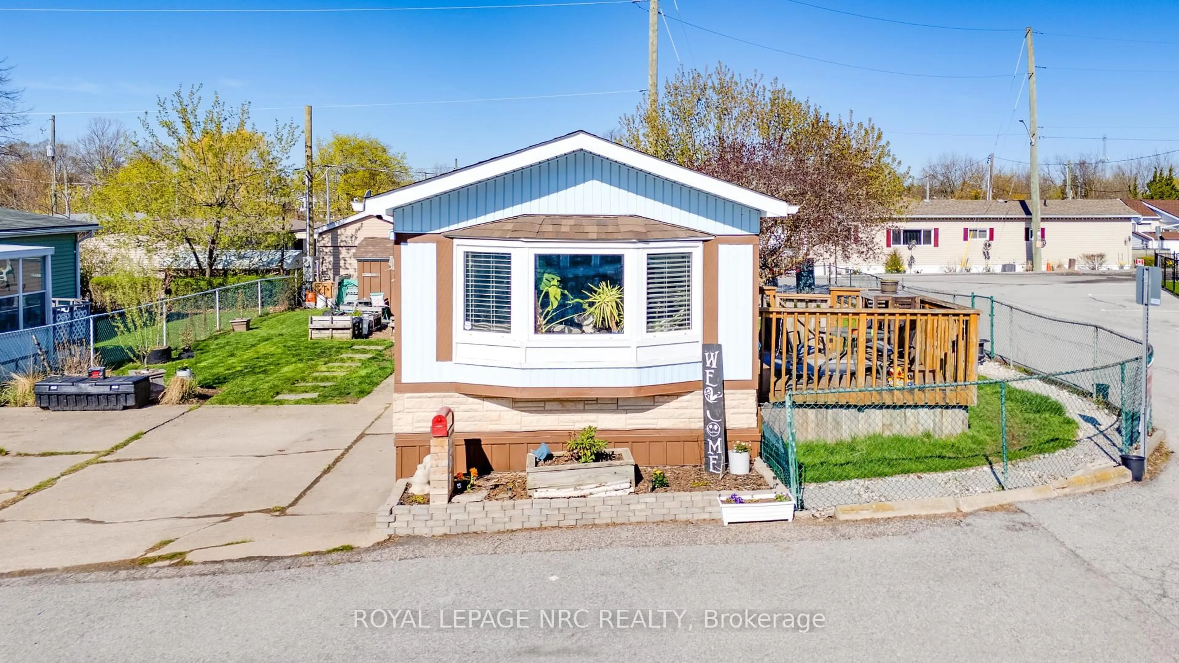 Home with vinyl exterior material, street for 241 St. Paul St #297, St. Catharines Ontario L2S 2E5