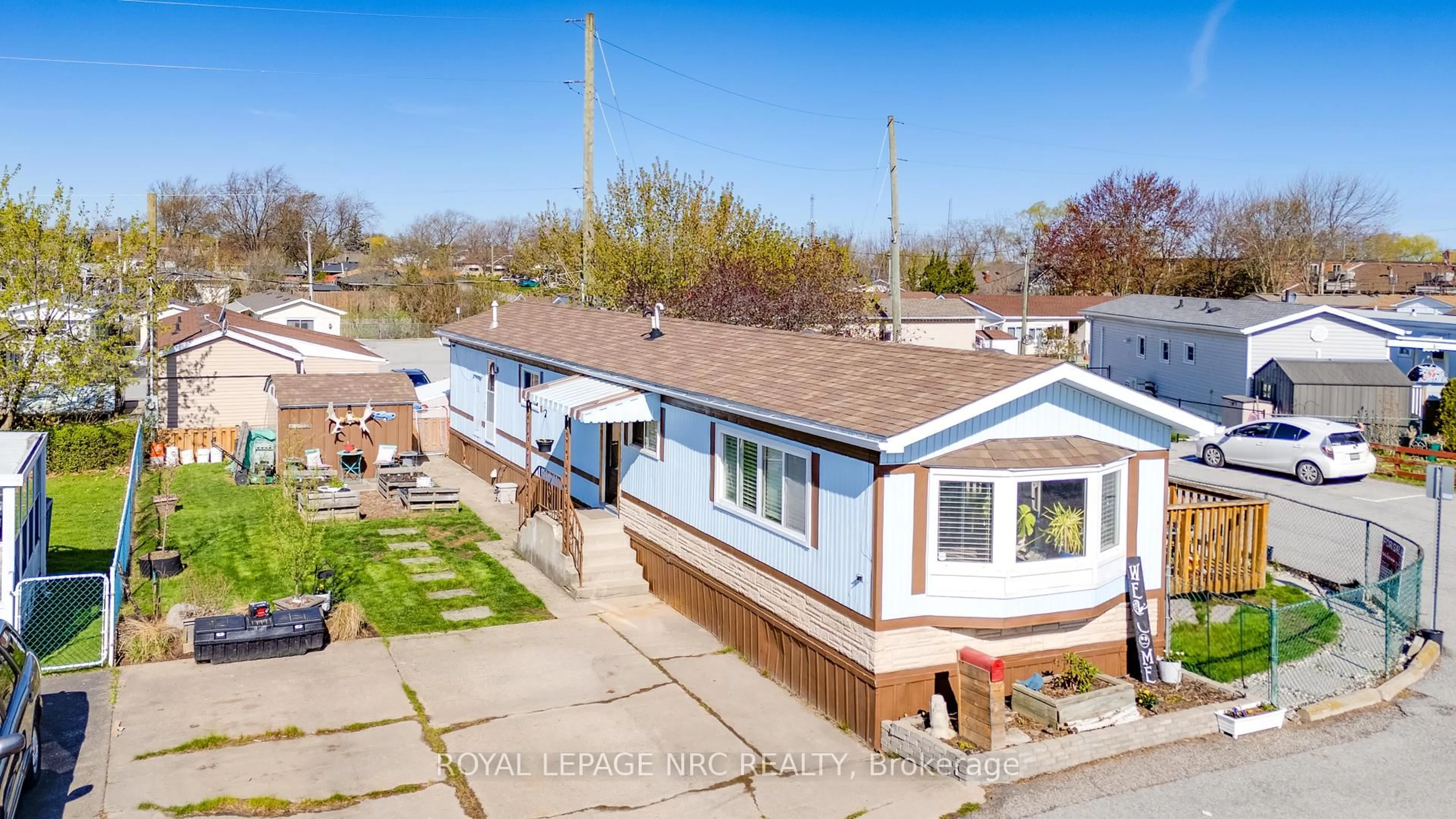 A pic from outside/outdoor area/front of a property/back of a property/a pic from drone, street for 241 St. Paul St #297, St. Catharines Ontario L2S 2E5