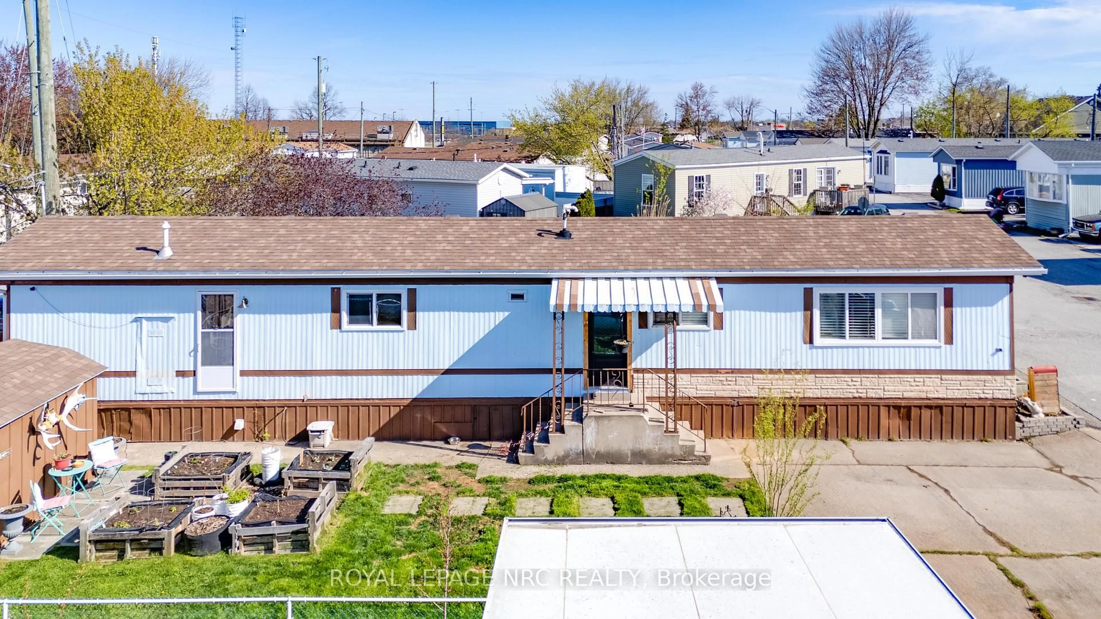 A pic from outside/outdoor area/front of a property/back of a property/a pic from drone, street for 241 St. Paul St #297, St. Catharines Ontario L2S 2E5