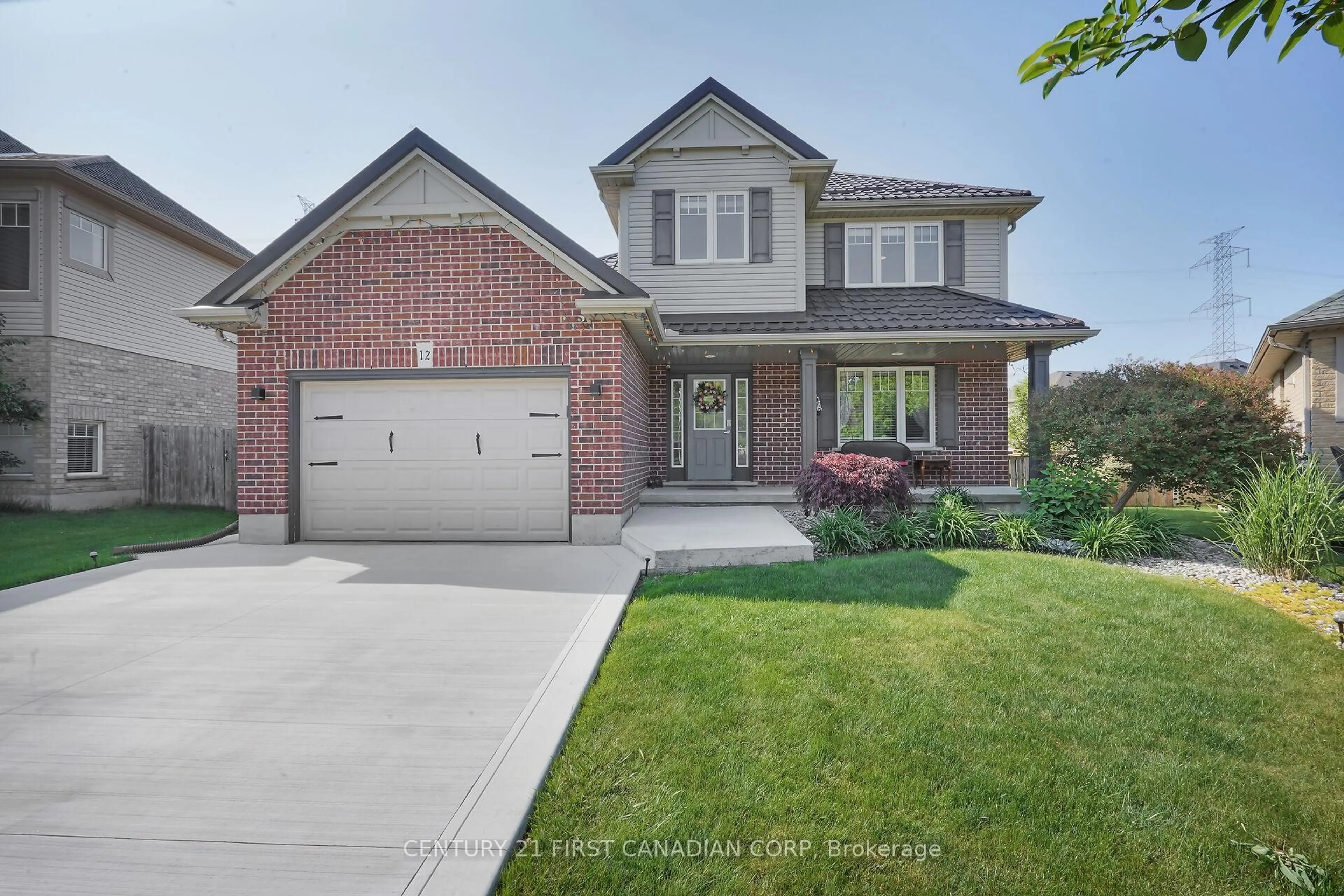 Home with brick exterior material, street for 12 Hawthorn Crt, St. Thomas Ontario N5P 0A1