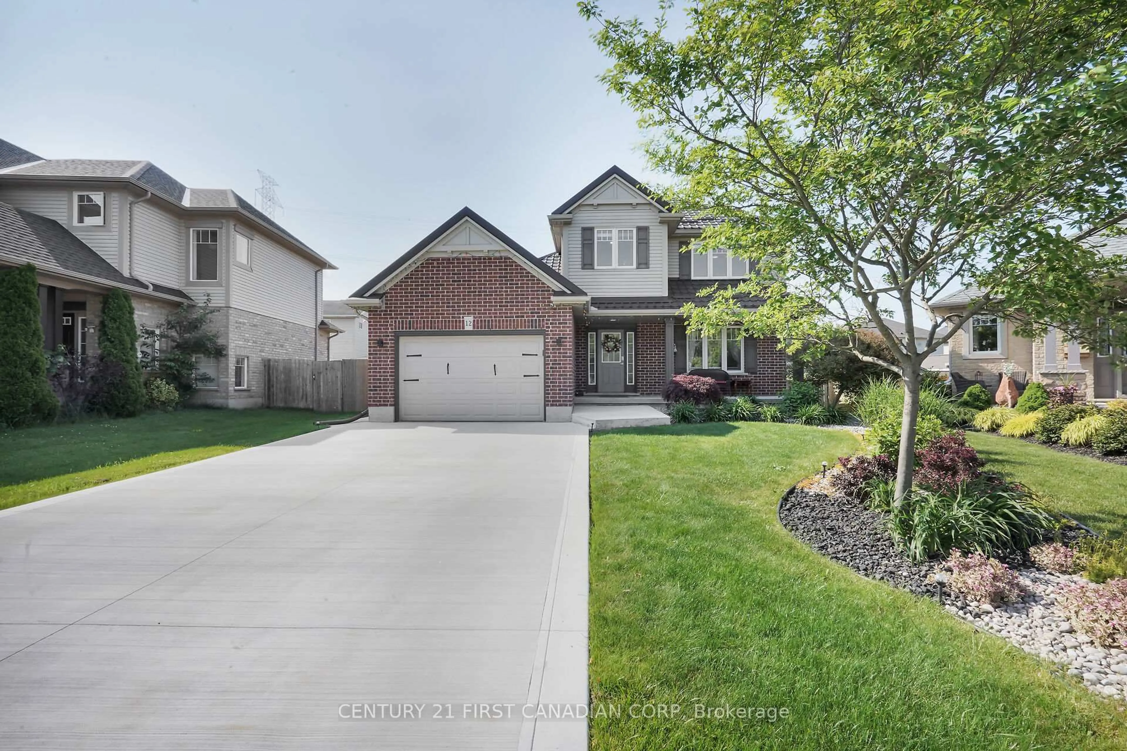 Home with brick exterior material, street for 12 Hawthorn Crt, St. Thomas Ontario N5P 0A1