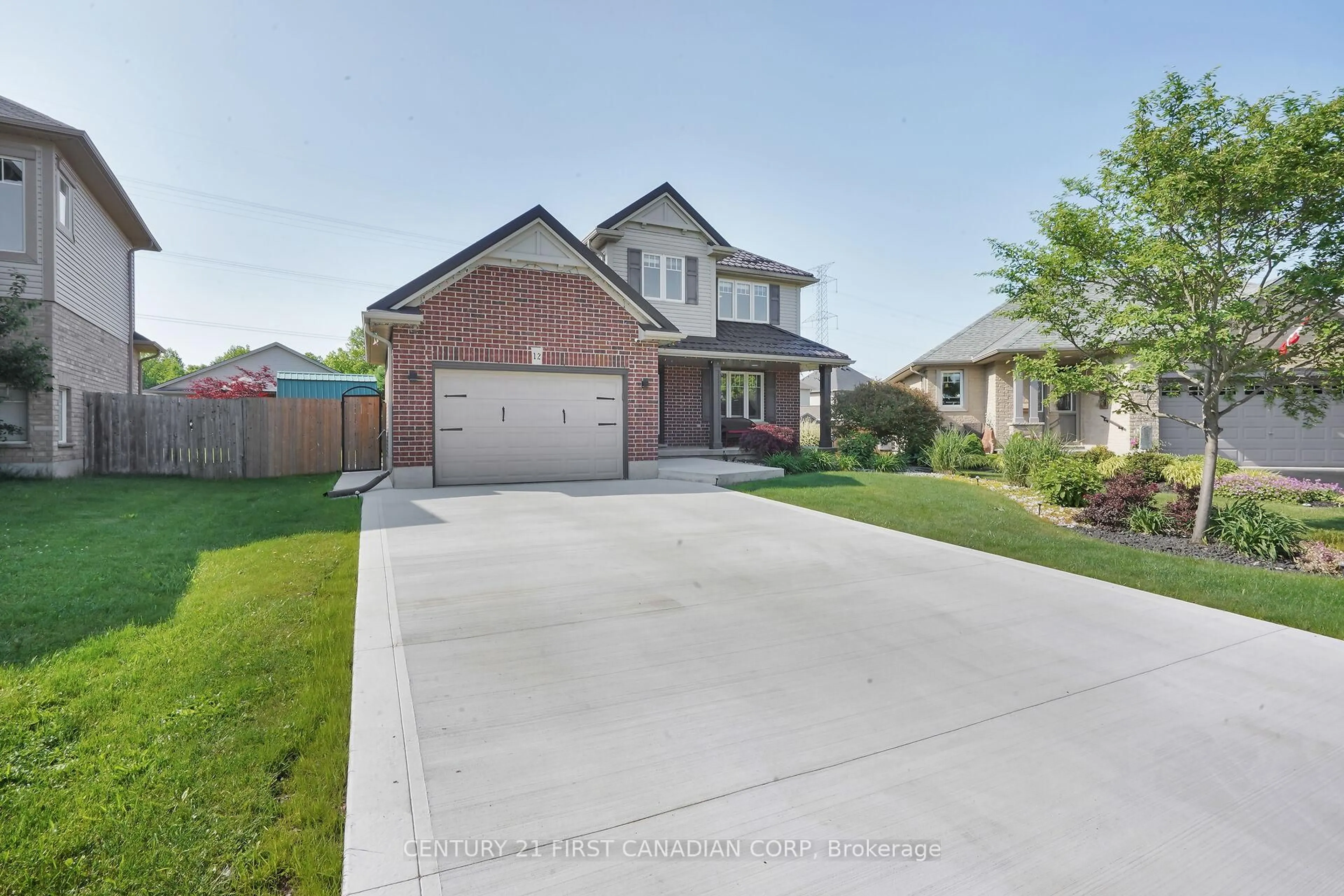 Home with brick exterior material, street for 12 Hawthorn Crt, St. Thomas Ontario N5P 0A1