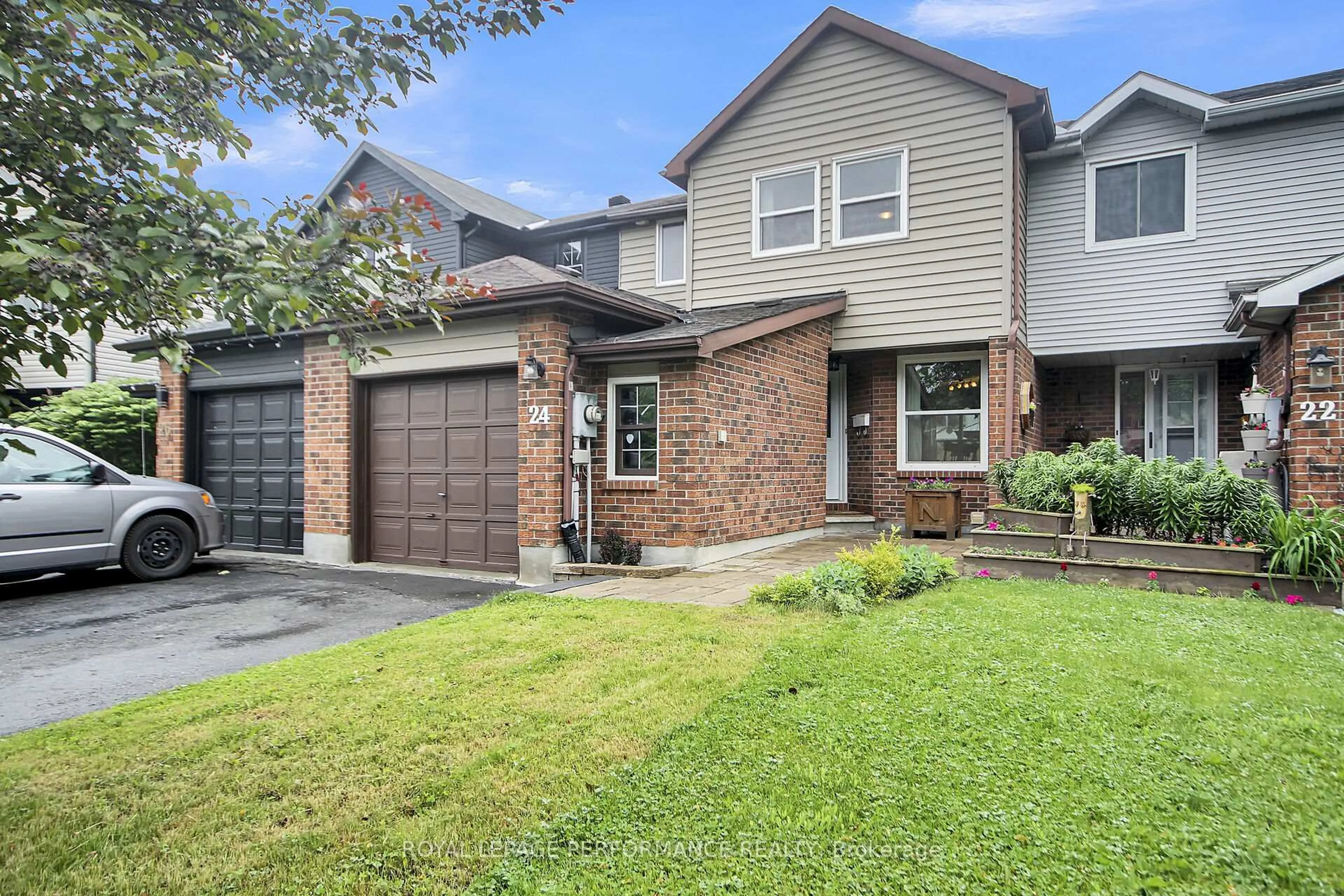 Home with brick exterior material, street for 24 Ayton Lane, Ottawa Ontario K2K 2J5