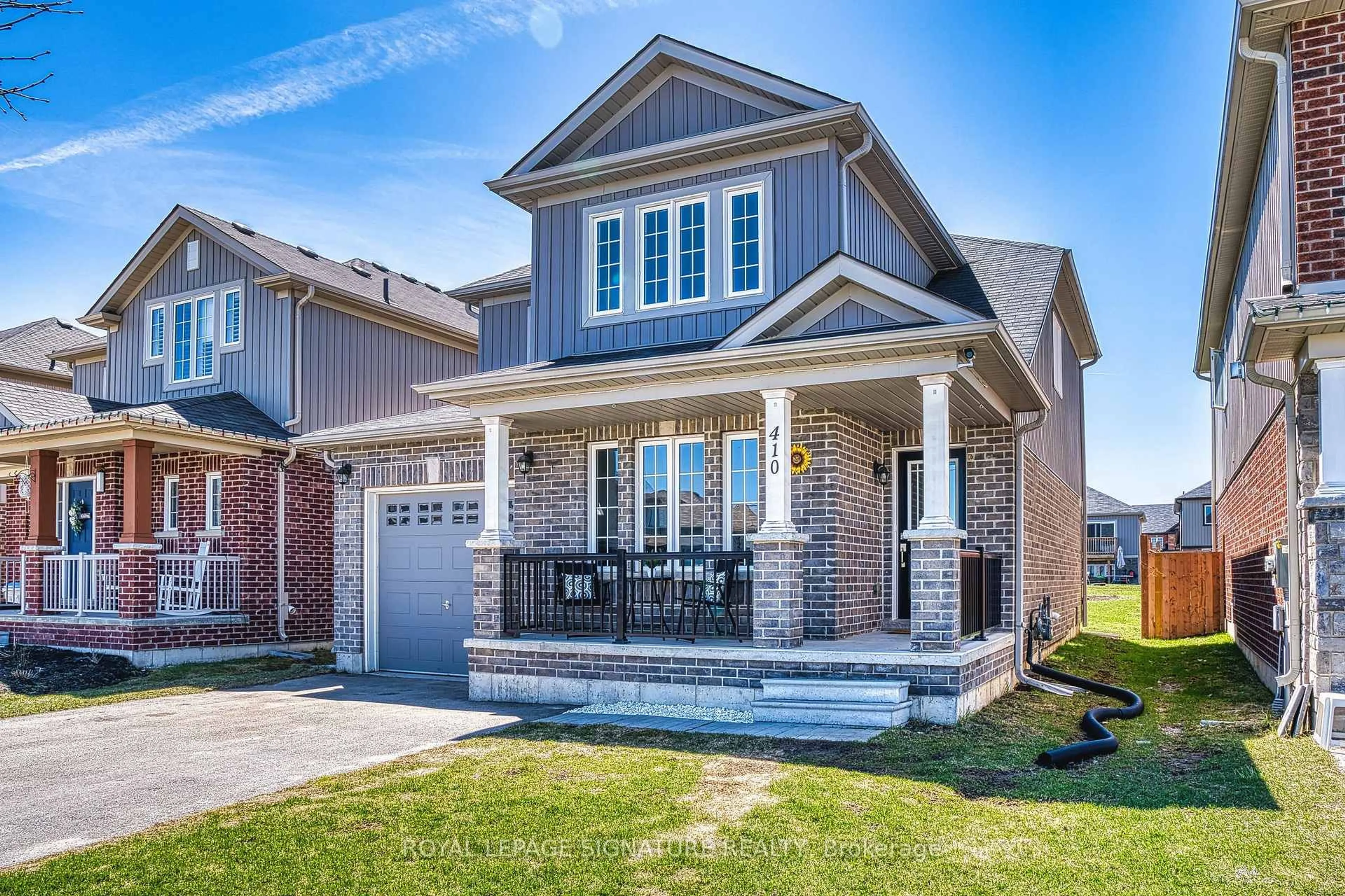 Home with brick exterior material, street for 410 Armstrong St, North Perth Ontario N4W 0E6
