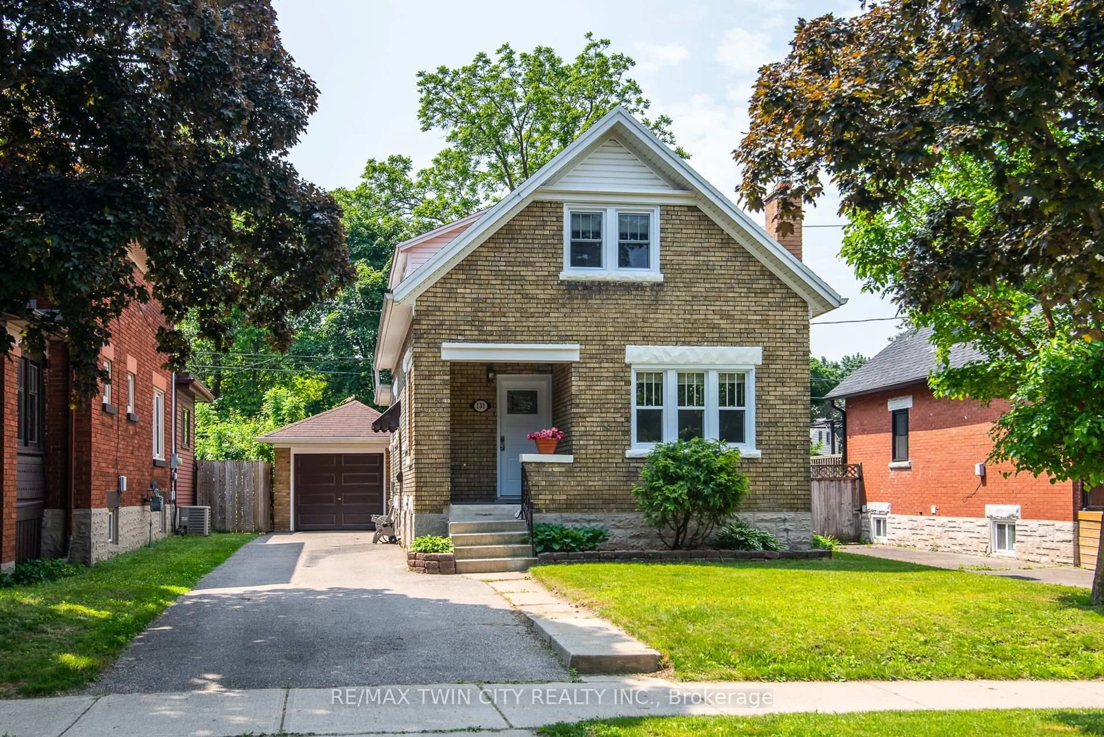 Home with brick exterior material, street for 131 Homewood Ave, Kitchener Ontario N2M 1X1