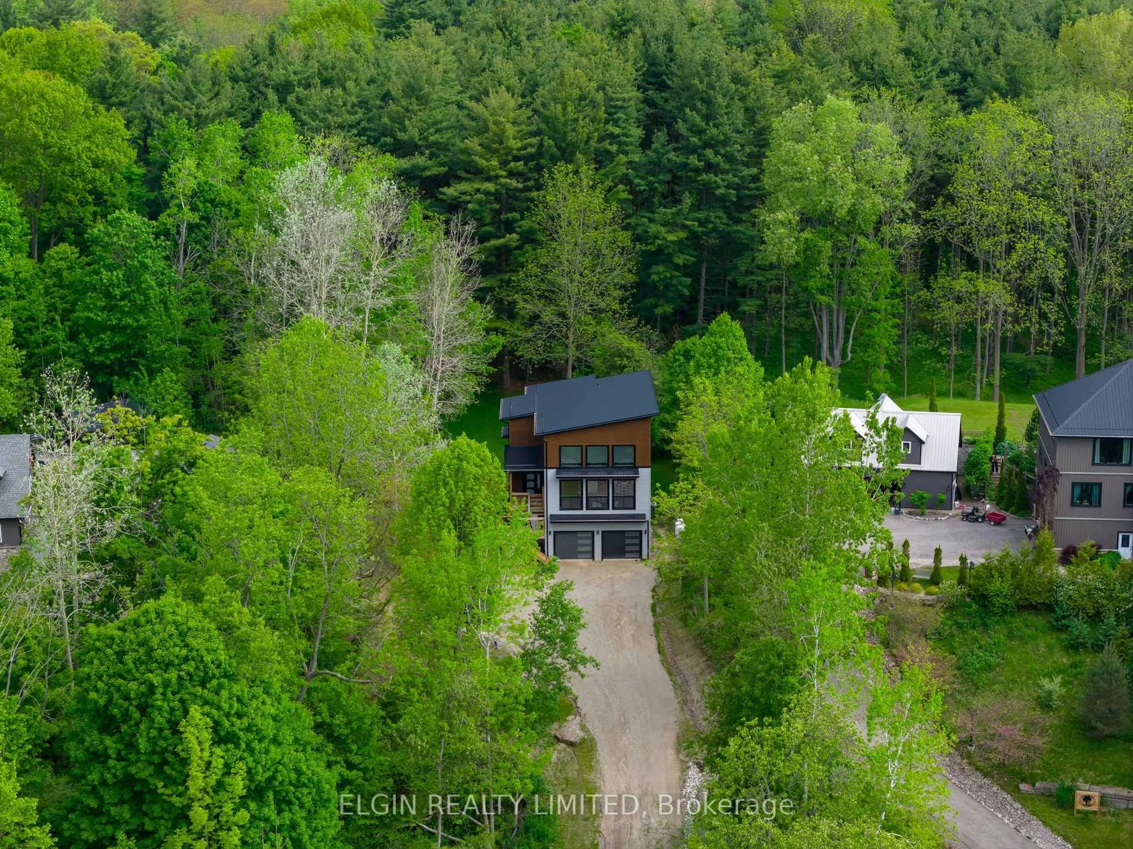 A pic from outside/outdoor area/front of a property/back of a property/a pic from drone, forest/trees view for 4132 Thomas Rd, Southwold Ontario N5L 1J2