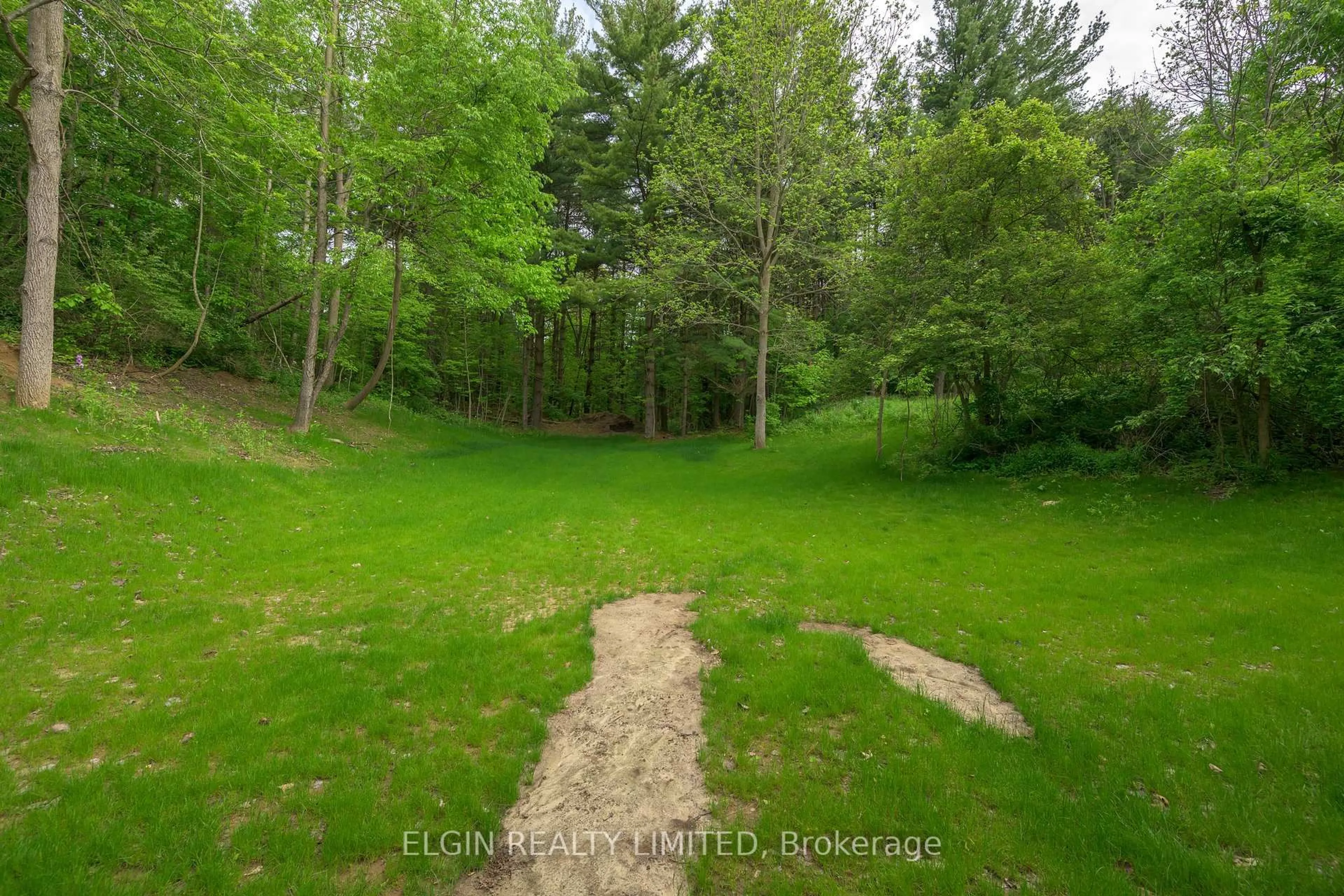 A pic from outside/outdoor area/front of a property/back of a property/a pic from drone, forest/trees view for 4132 Thomas Rd, Southwold Ontario N5L 1J2