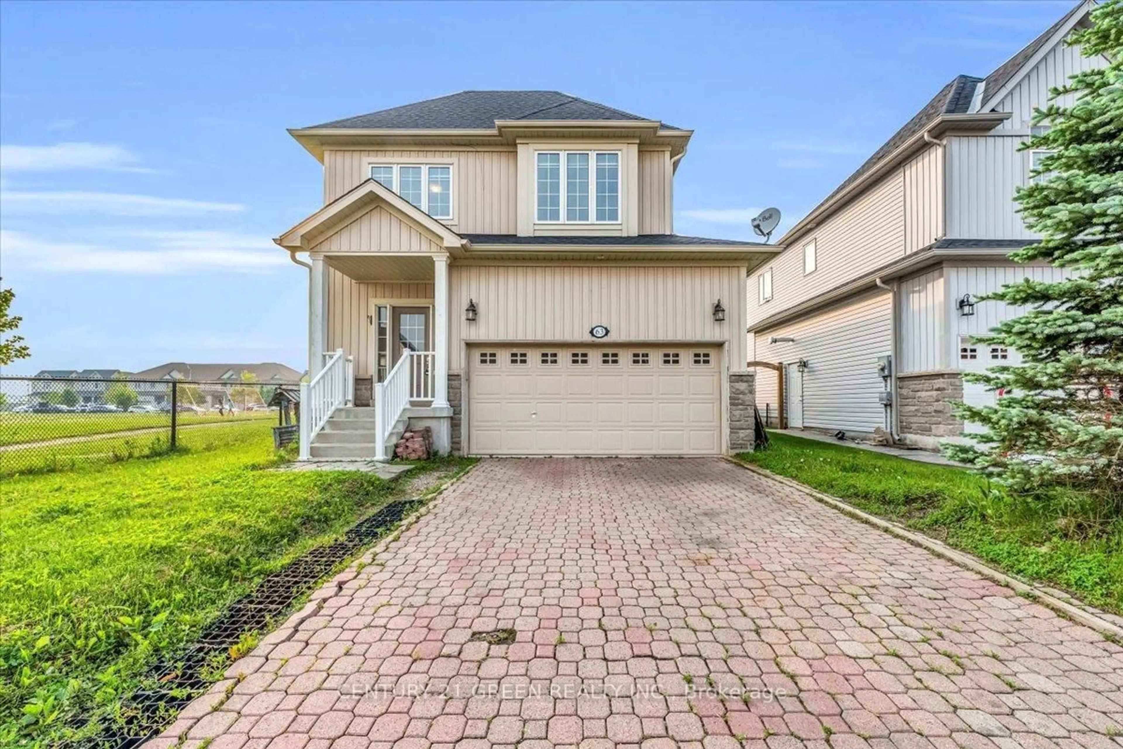 Home with vinyl exterior material, street for 63 Ryan St, Centre Wellington Ontario N1M 0C9