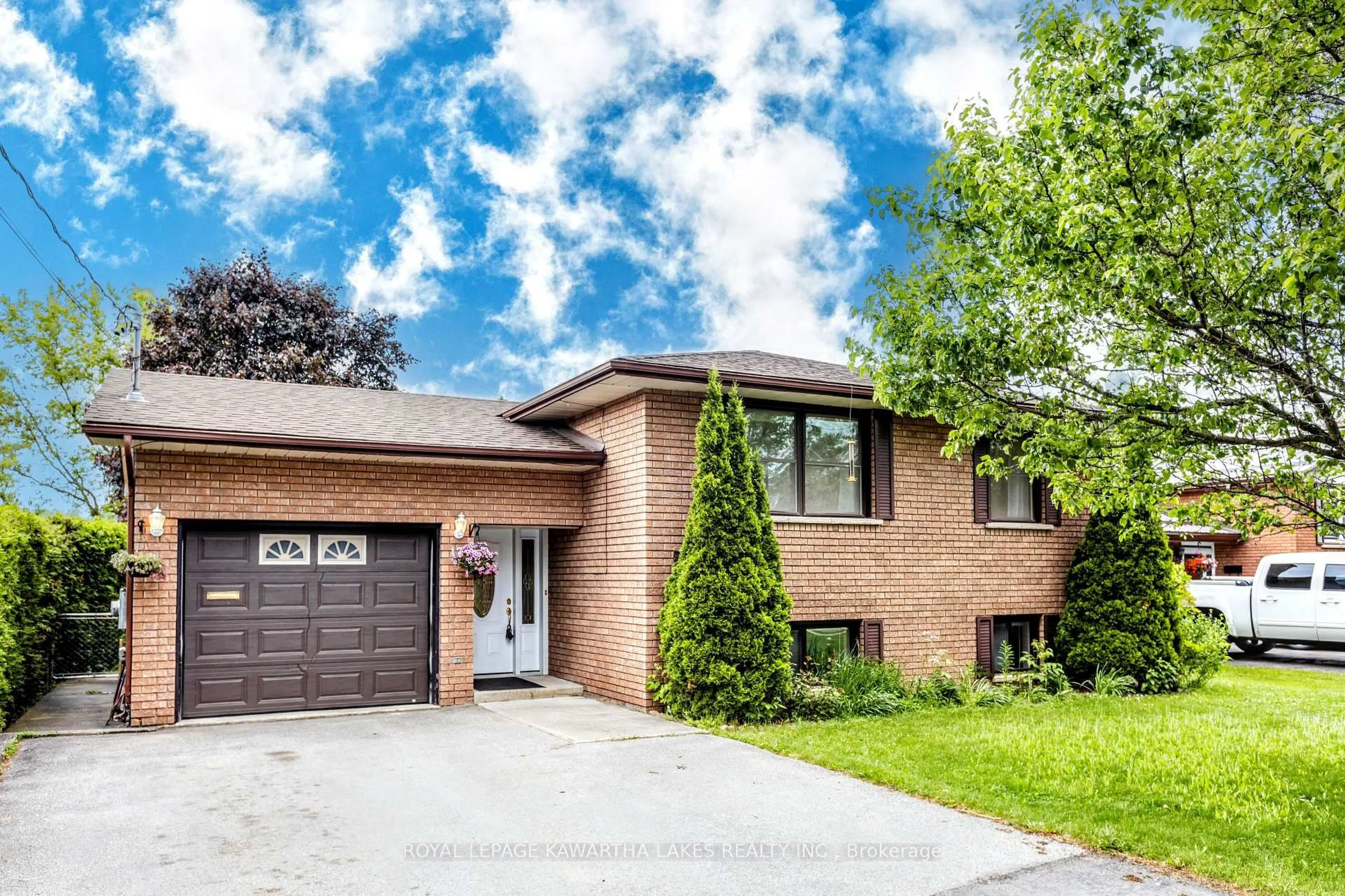 Home with brick exterior material, street for 12 Hillside Dr, Kawartha Lakes Ontario K9V 1A4