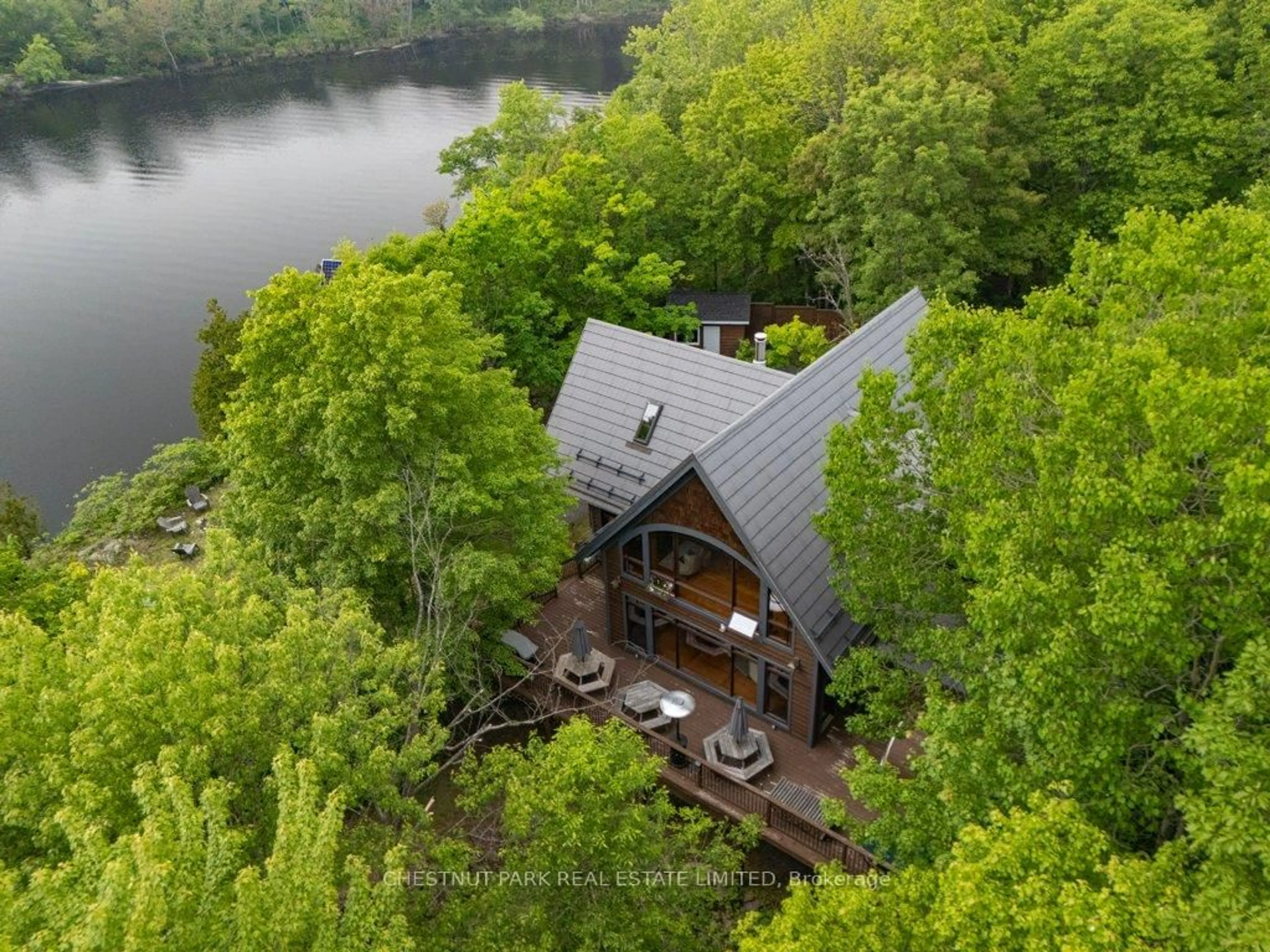 A pic from outside/outdoor area/front of a property/back of a property/a pic from drone, water/lake/river/ocean view for 488 Gull Creek Lane, Tamworth Ontario K0K 3G0
