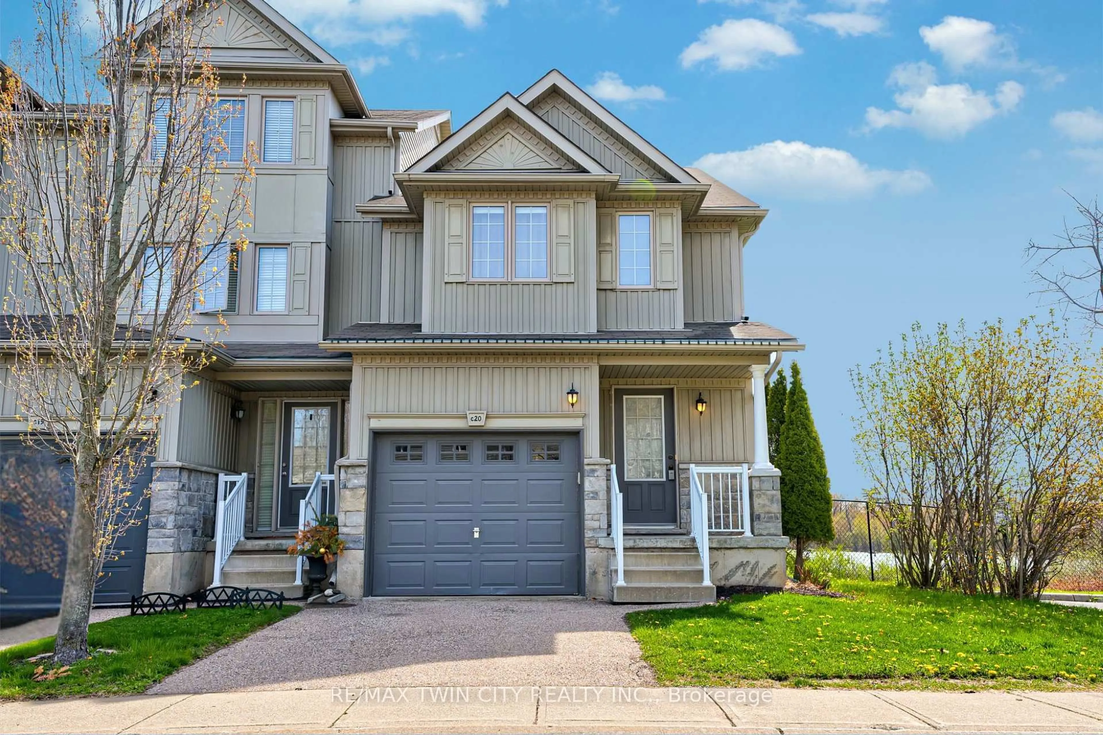 Home with vinyl exterior material, street for 20 David Bergey Dr #C20, Kitchener Ontario N2E 0B1