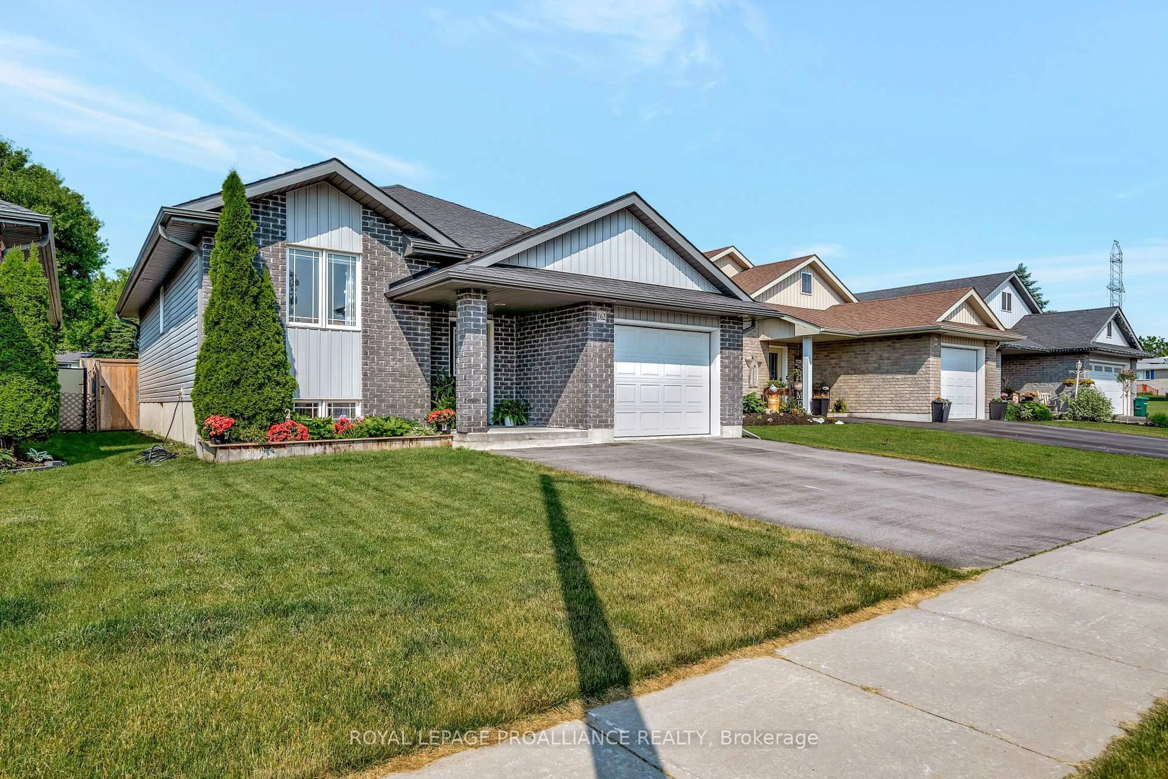 Home with vinyl exterior material, street for 162 Greenhill Lane, Belleville Ontario K8N 0C7