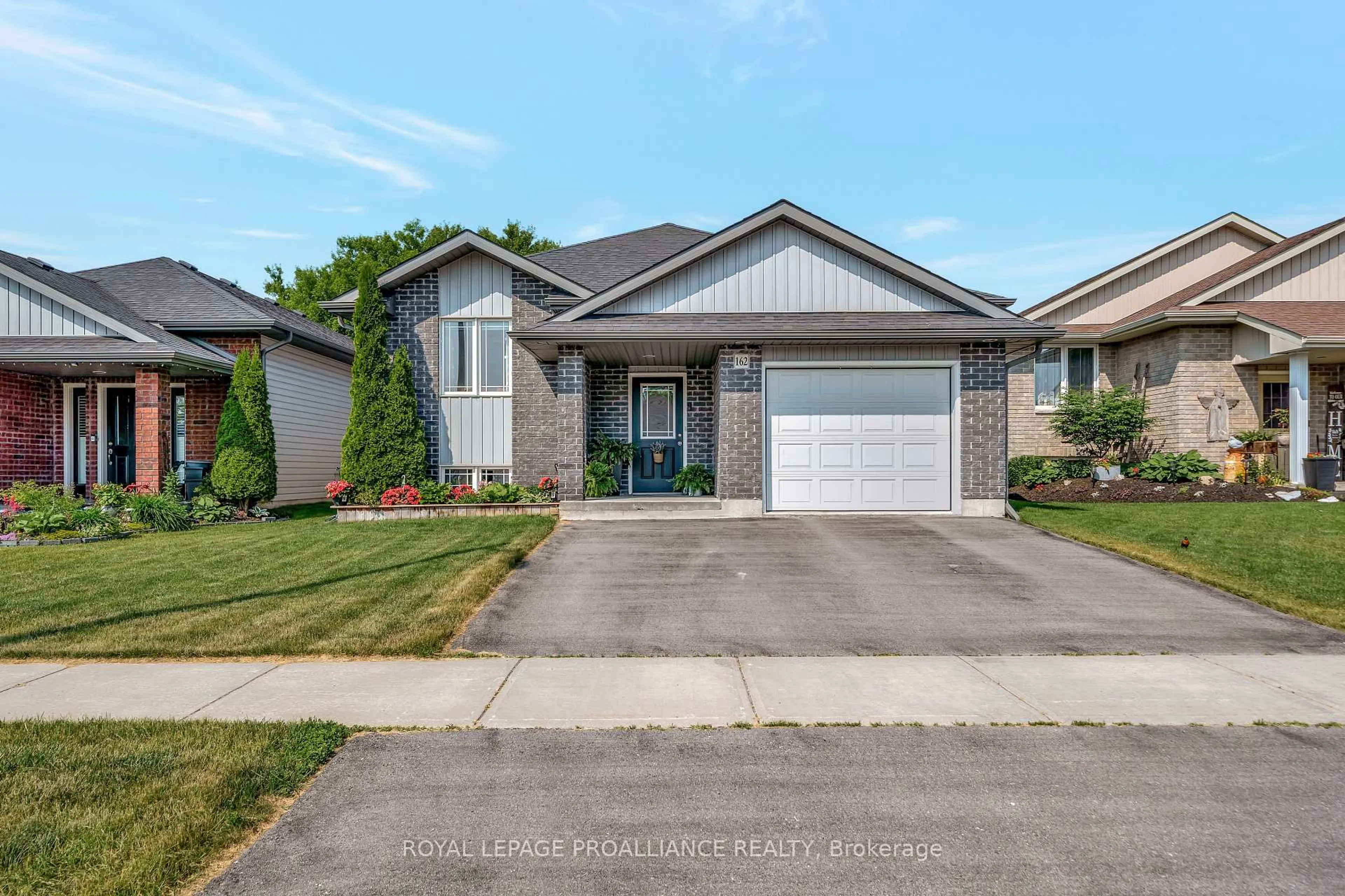 Home with brick exterior material, street for 162 Greenhill Lane, Belleville Ontario K8N 0C7