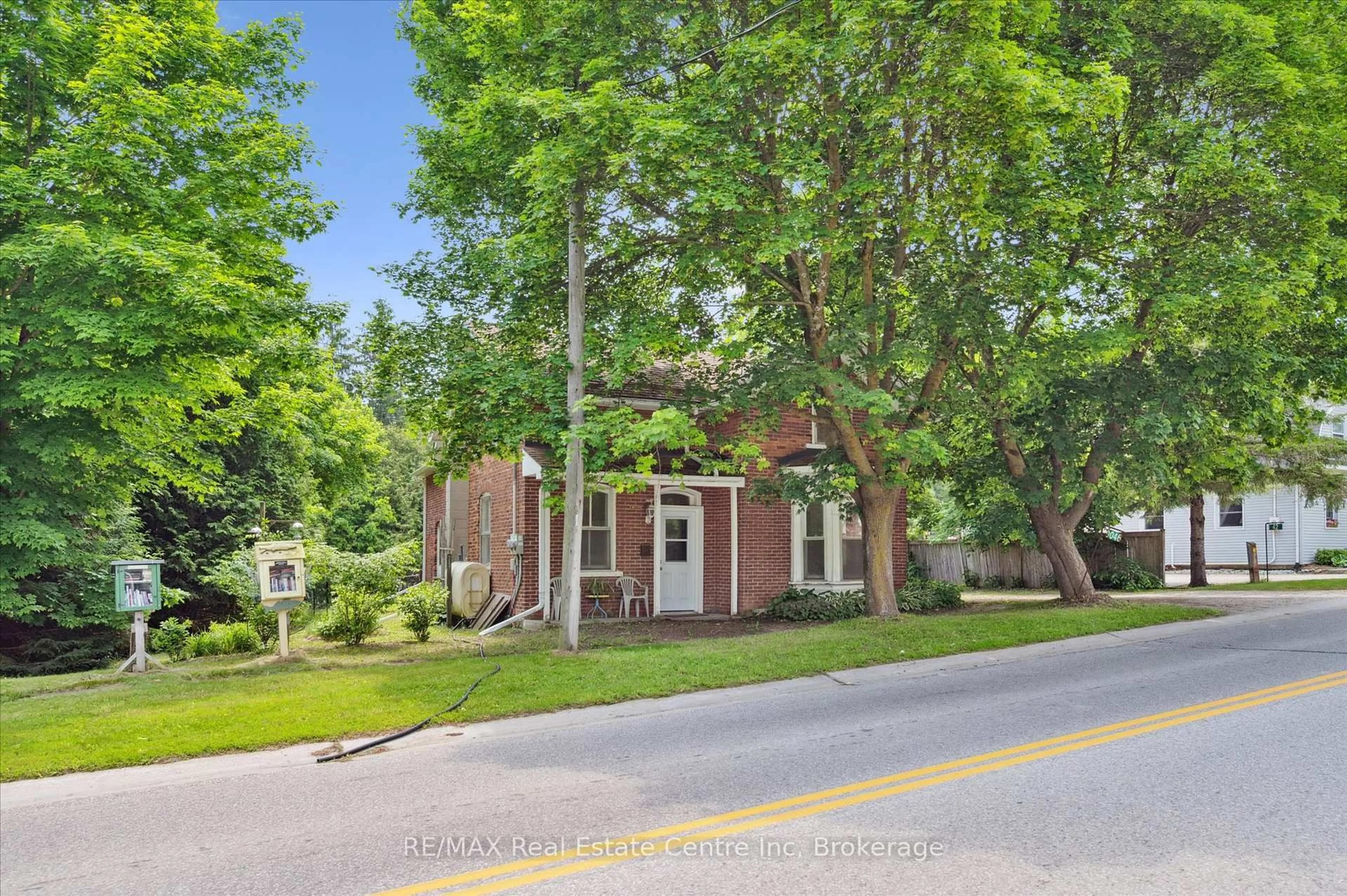 Home with brick exterior material, street for 46 Wellington Road 19 Rd, Centre Wellington Ontario N0B 1J0