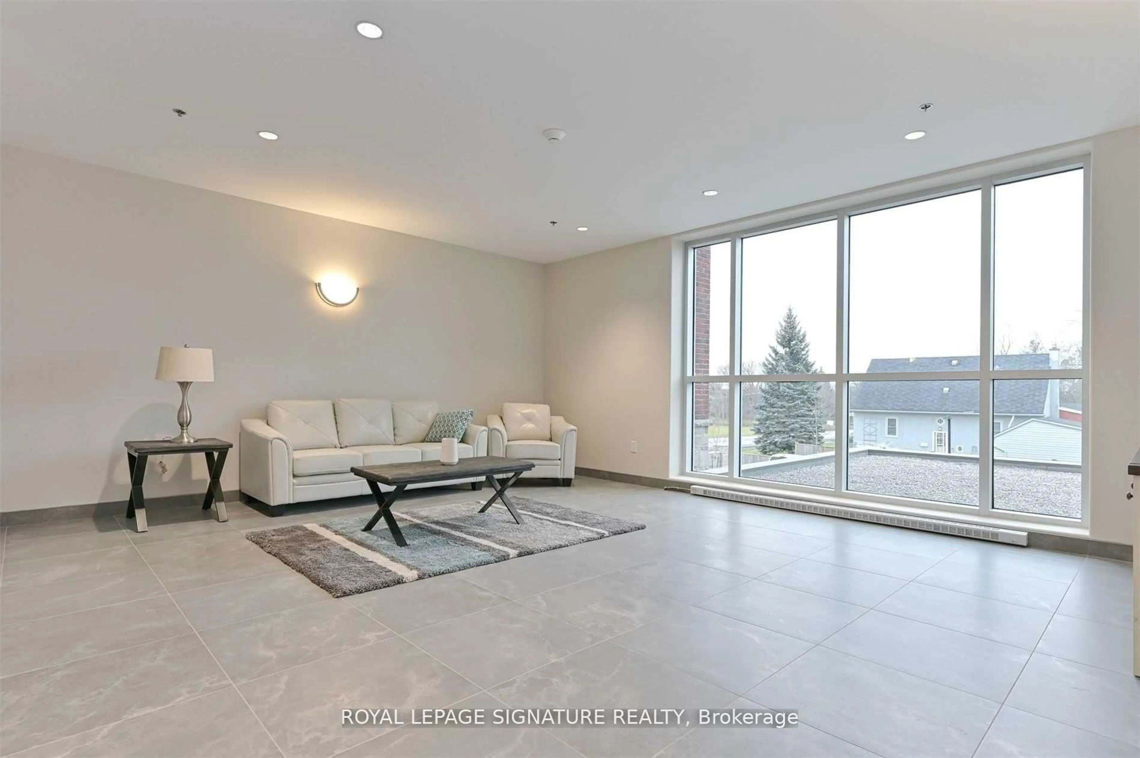 Living room with furniture, unknown for 529 South Pelham Rd #208, Welland Ontario L3C 0H7