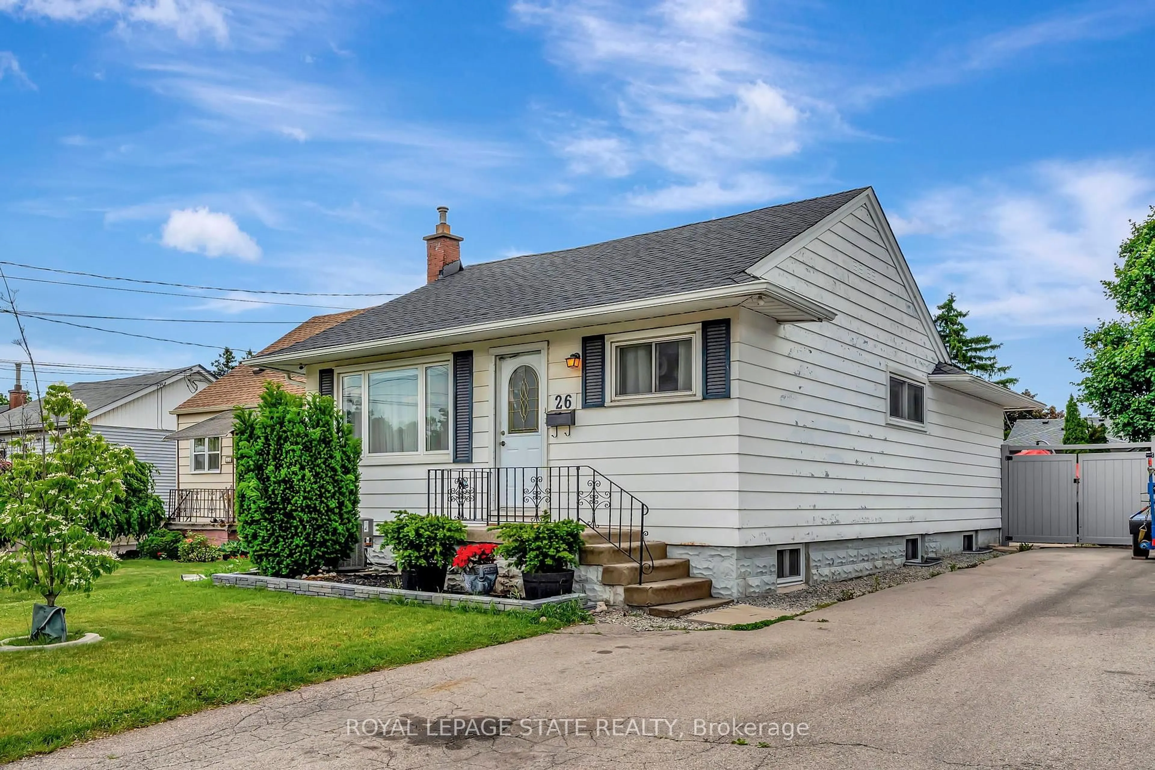 Home with vinyl exterior material, street for 26 Adeline Ave, Hamilton Ontario L8H 5T4