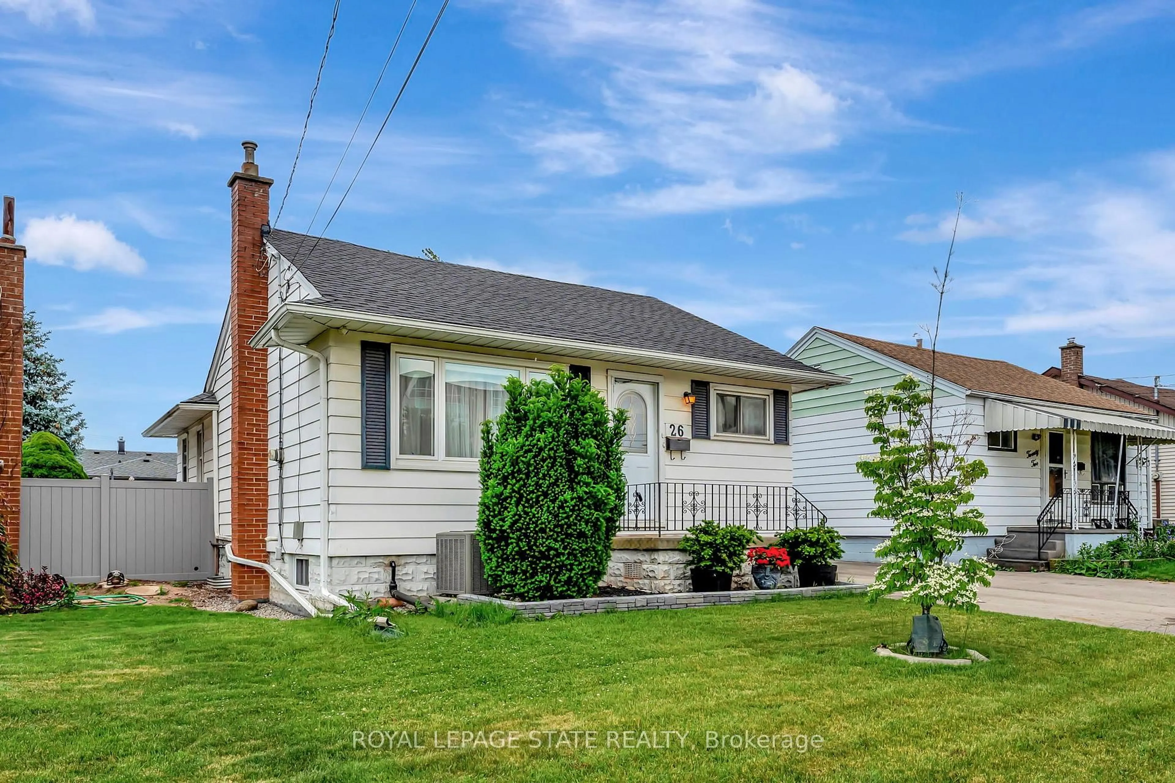 Home with vinyl exterior material, street for 26 Adeline Ave, Hamilton Ontario L8H 5T4