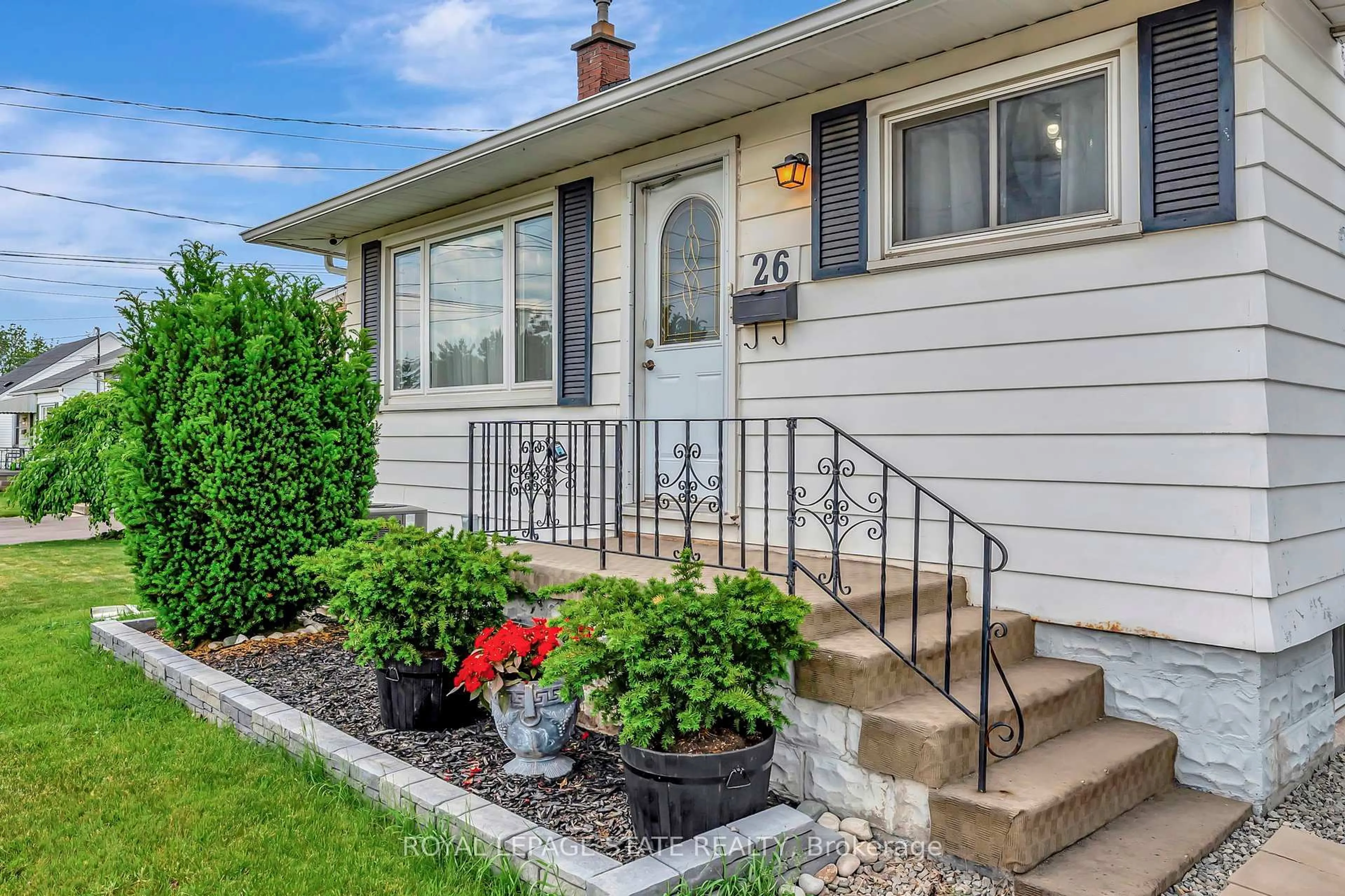 Home with vinyl exterior material, street for 26 Adeline Ave, Hamilton Ontario L8H 5T4