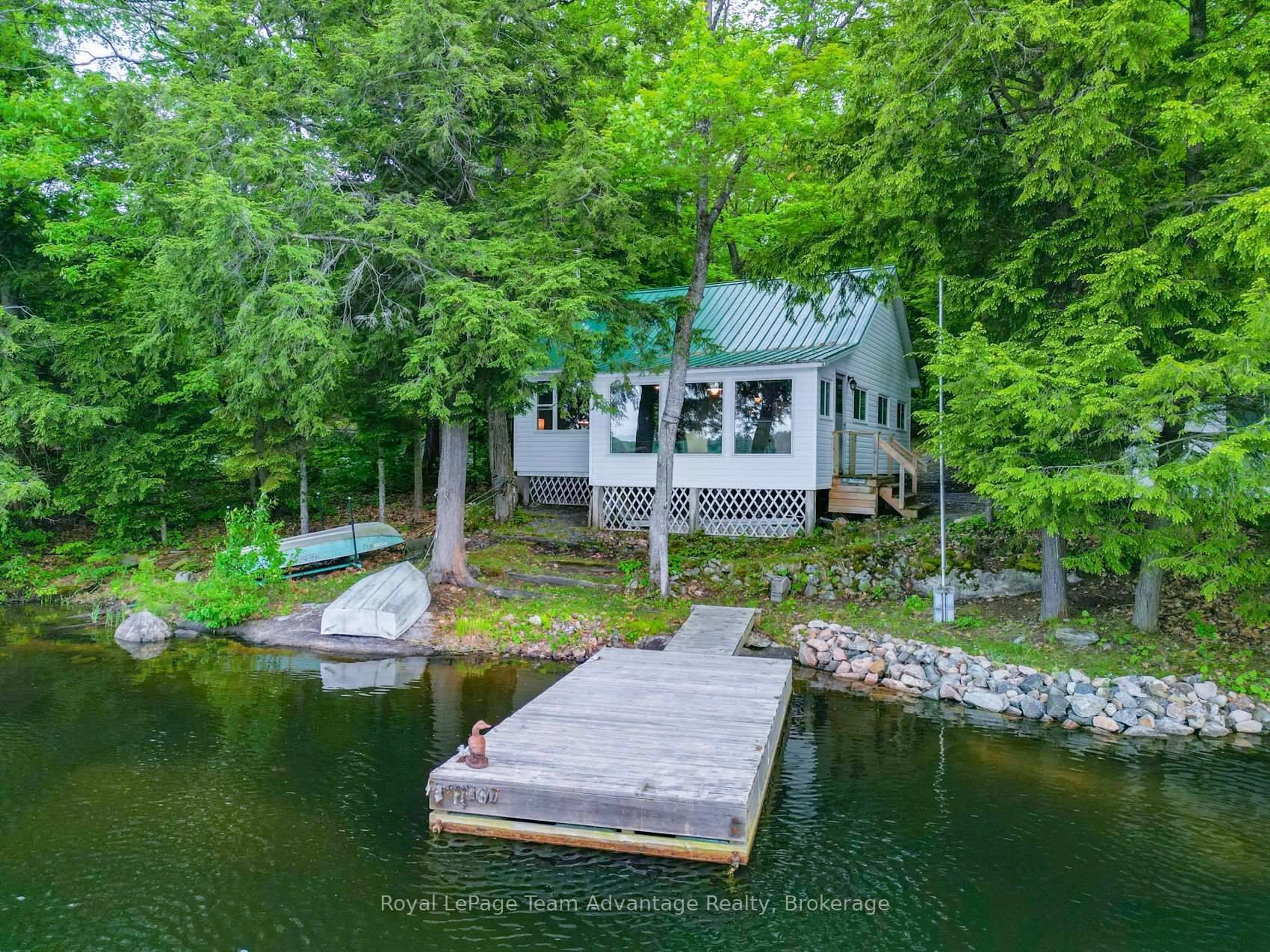 A pic from outside/outdoor area/front of a property/back of a property/a pic from drone, water/lake/river/ocean view for 8 Waterside Dr, Seguin Ontario P2A 0B6