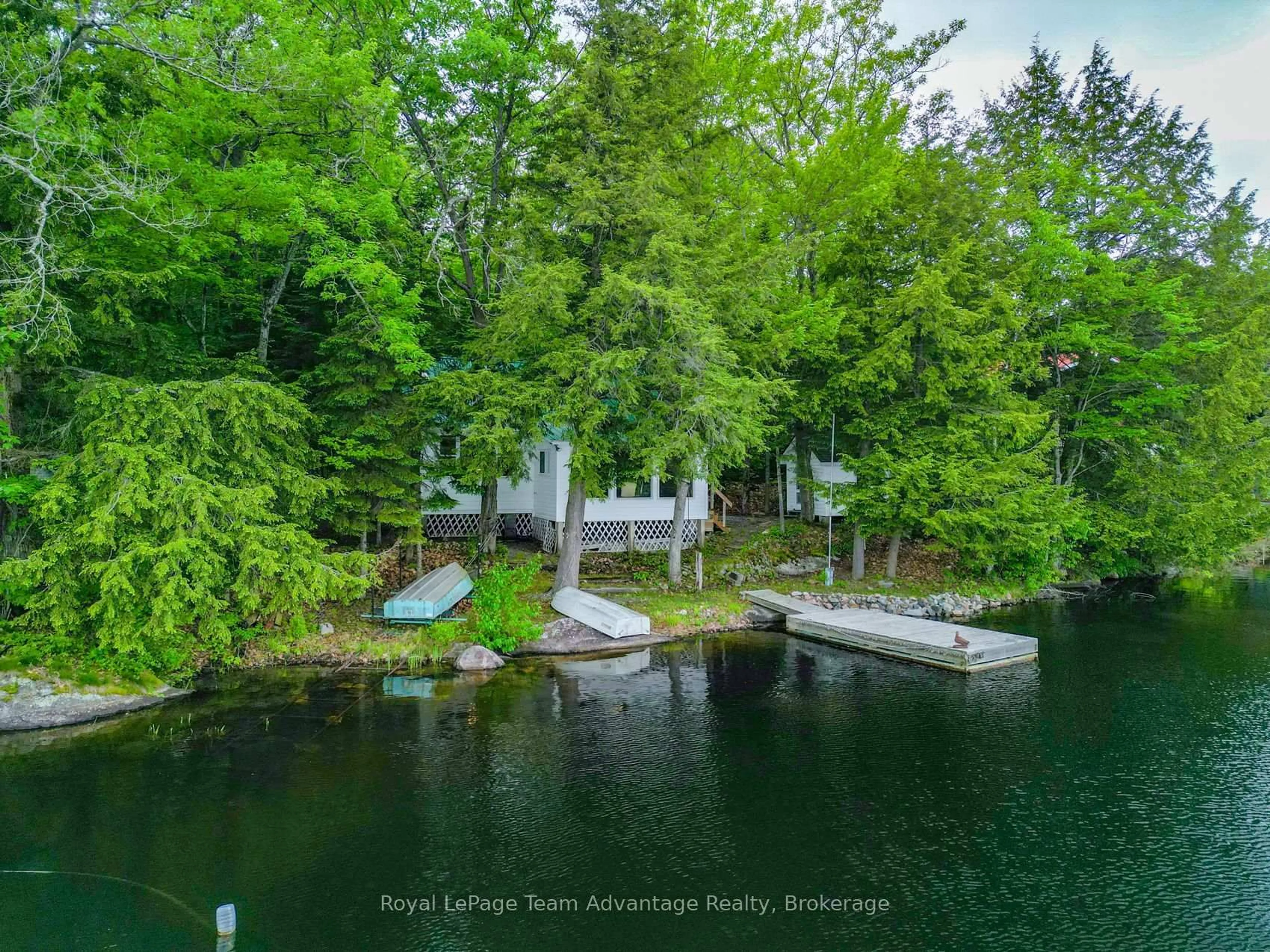 A pic from outside/outdoor area/front of a property/back of a property/a pic from drone, water/lake/river/ocean view for 8 Waterside Dr, Seguin Ontario P2A 0B6
