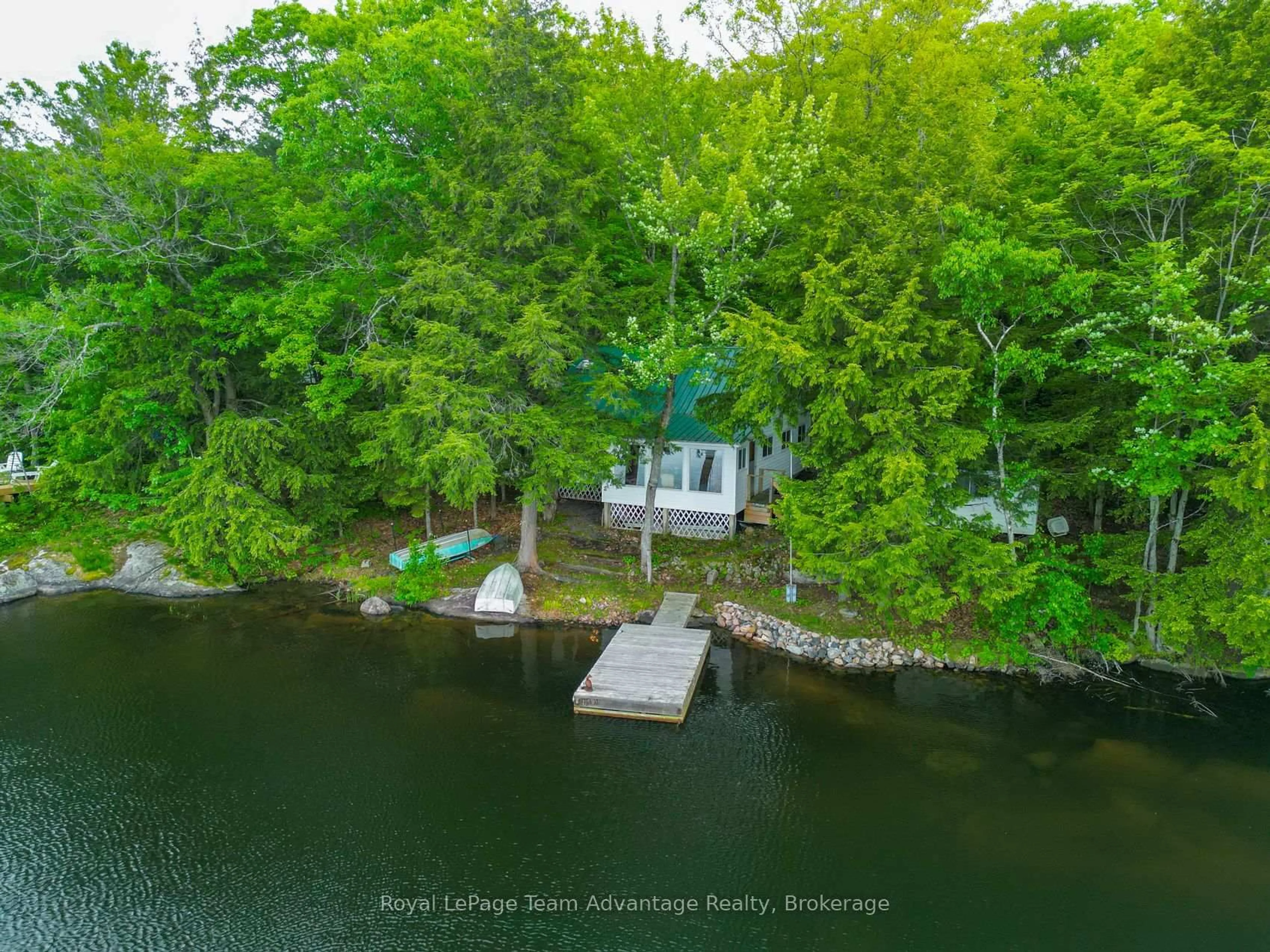 A pic from outside/outdoor area/front of a property/back of a property/a pic from drone, water/lake/river/ocean view for 8 Waterside Dr, Seguin Ontario P2A 0B6