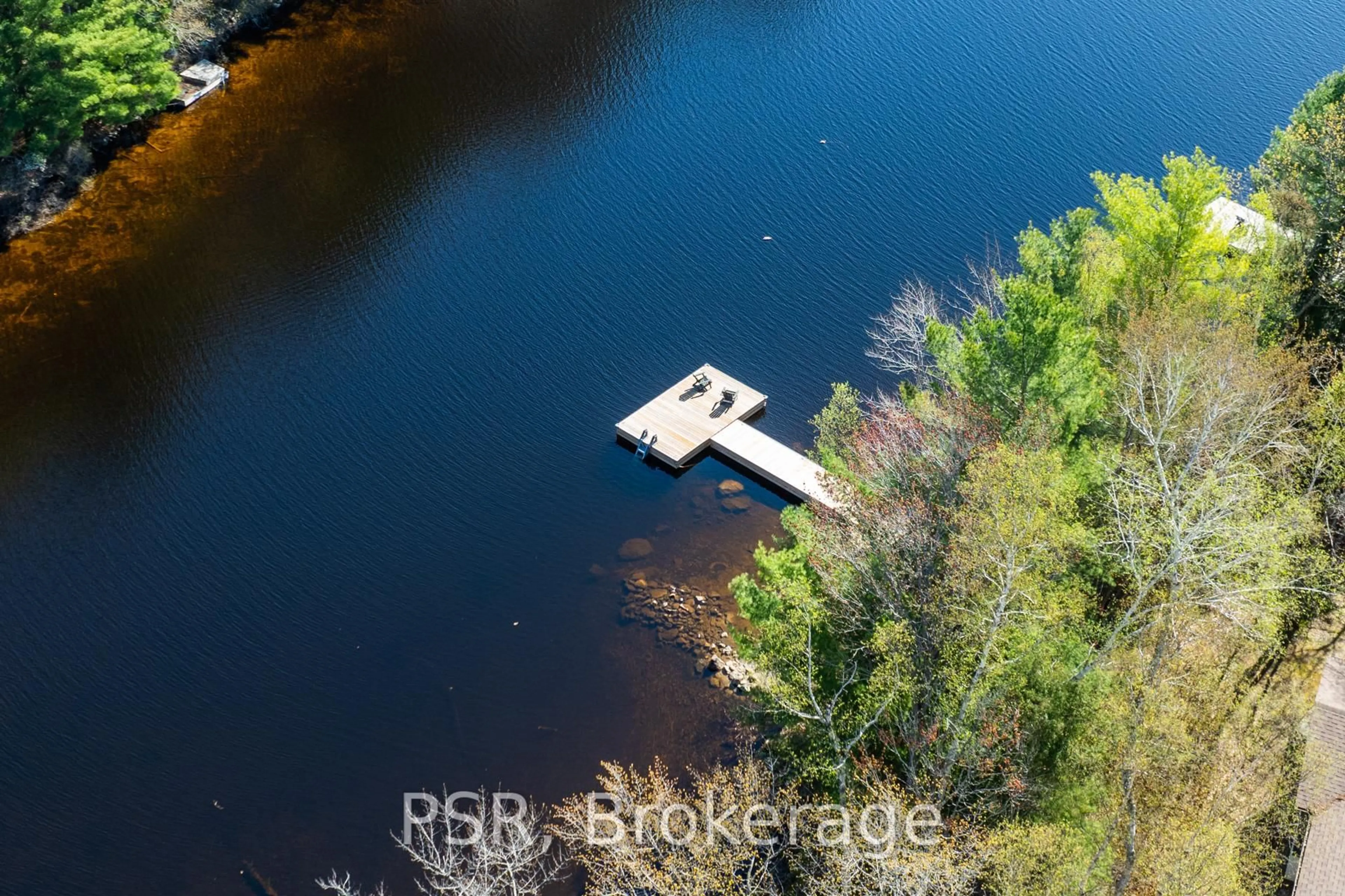 A pic from outside/outdoor area/front of a property/back of a property/a pic from drone, water/lake/river/ocean view for 281 Stewart Lake Rd, Georgian Bay Ontario P0C 1H0