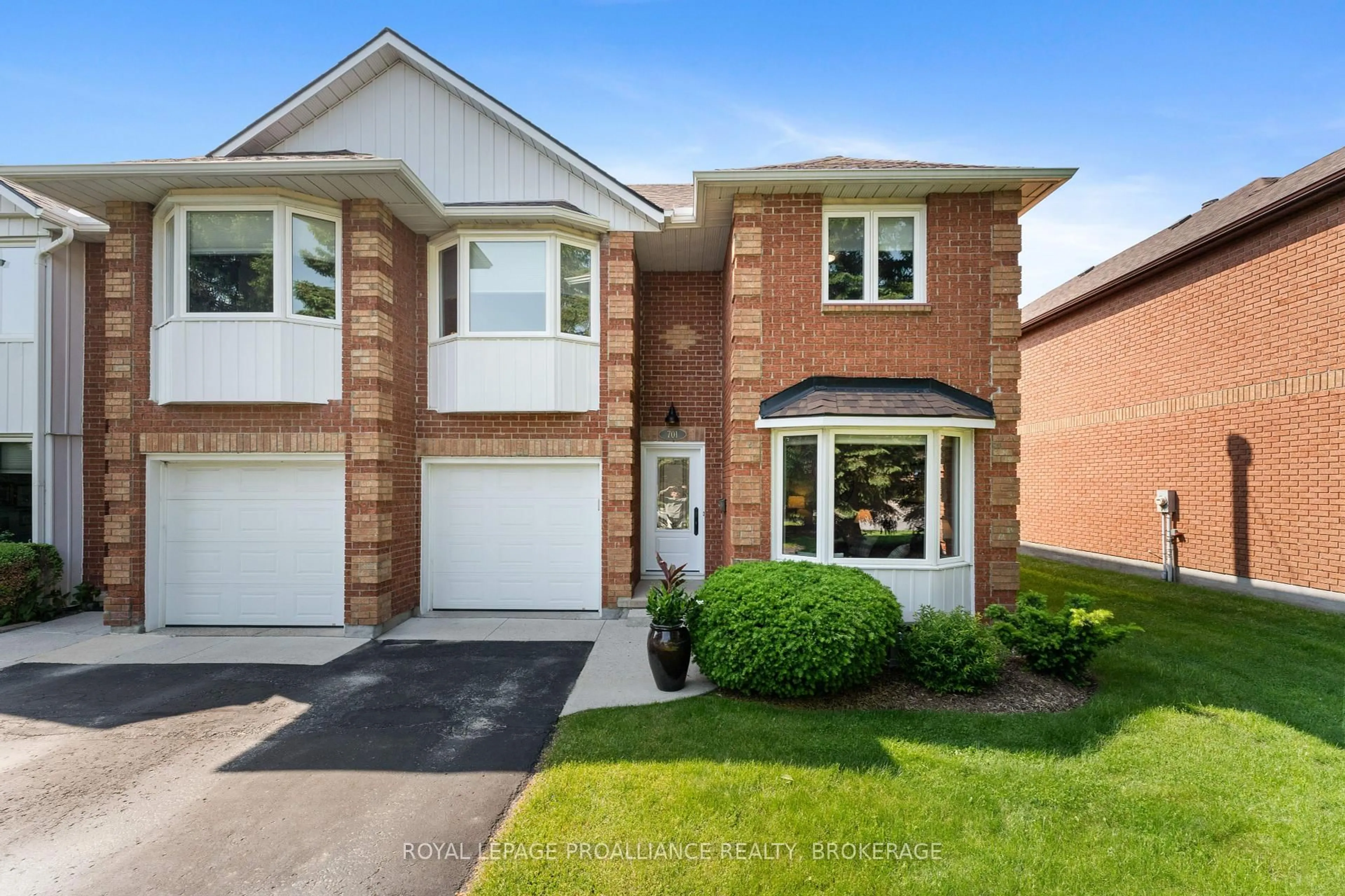 Home with brick exterior material, street for 701 Davis Dr #8, Kingston Ontario K7M 7X5