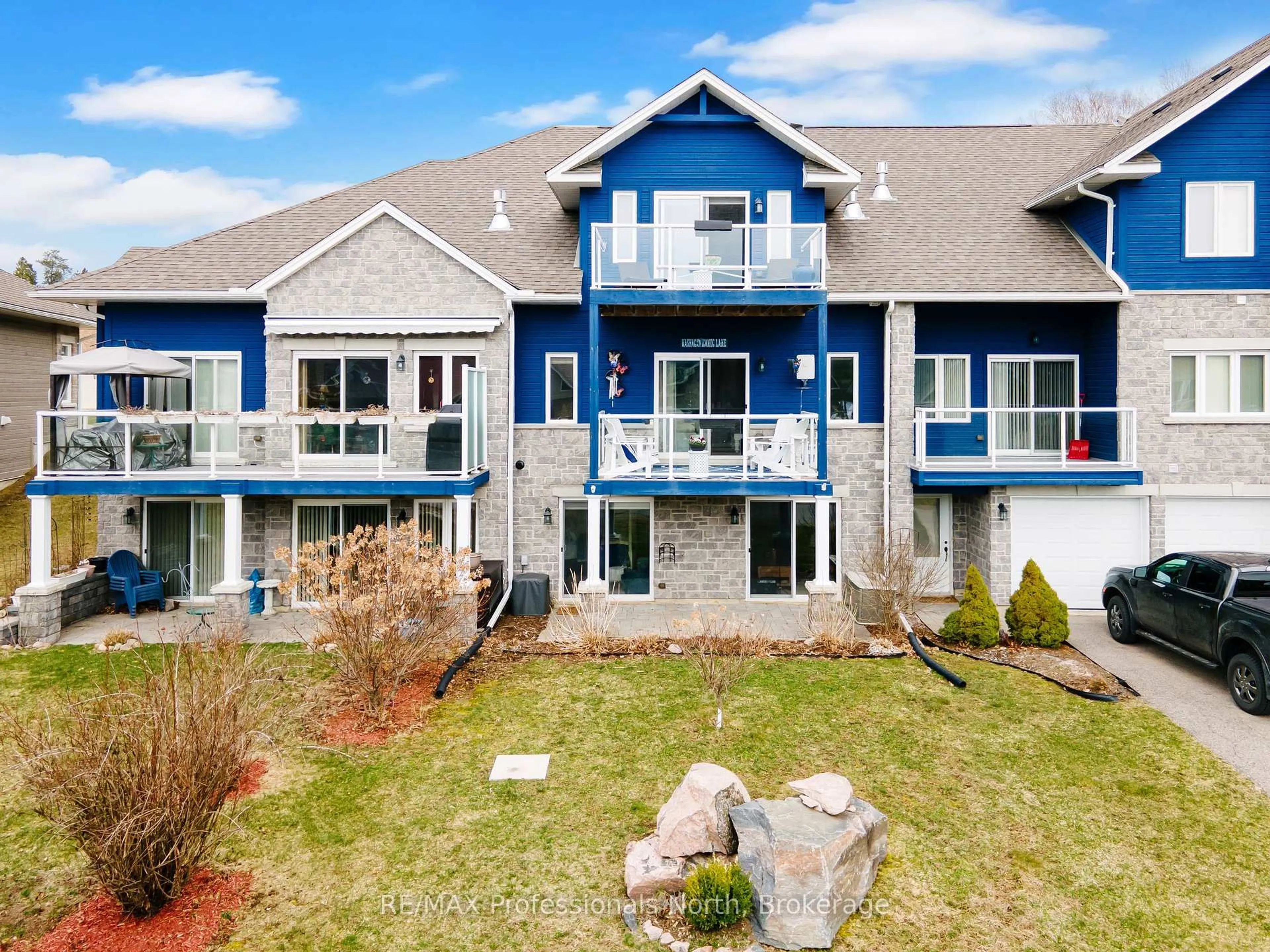 A pic from outside/outdoor area/front of a property/back of a property/a pic from drone, water/lake/river/ocean view for 68 Webb Circ #13, Dysart et al Ontario K0M 1S0