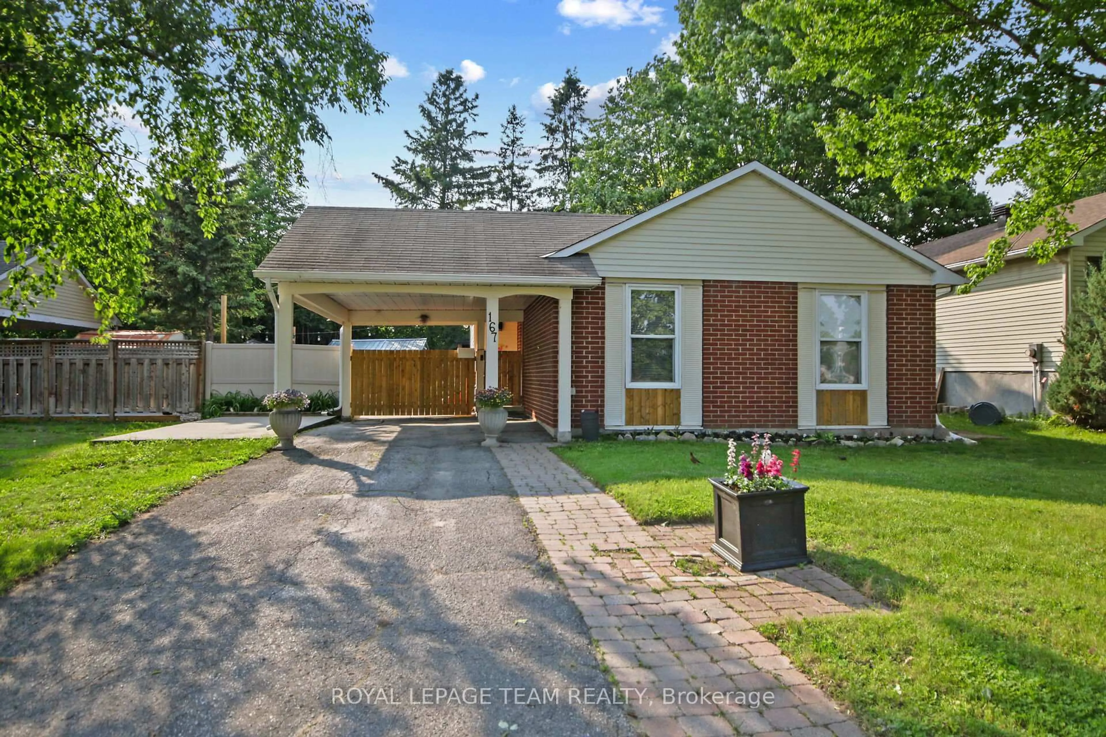 Home with brick exterior material, street for 167 Abbeyhill Dr, Kanata Ontario K2L 2E9