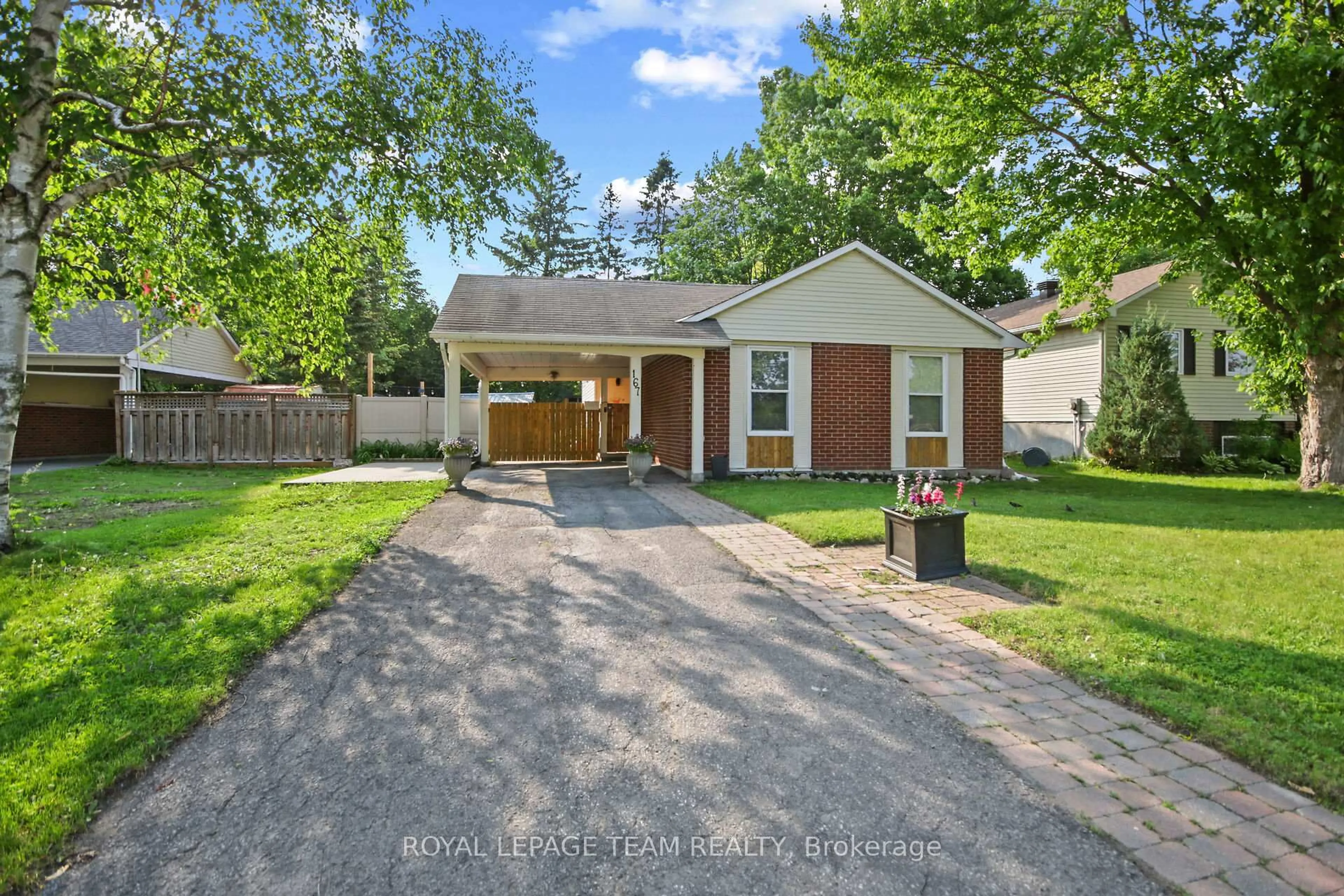 Home with brick exterior material, street for 167 Abbeyhill Dr, Kanata Ontario K2L 2E9
