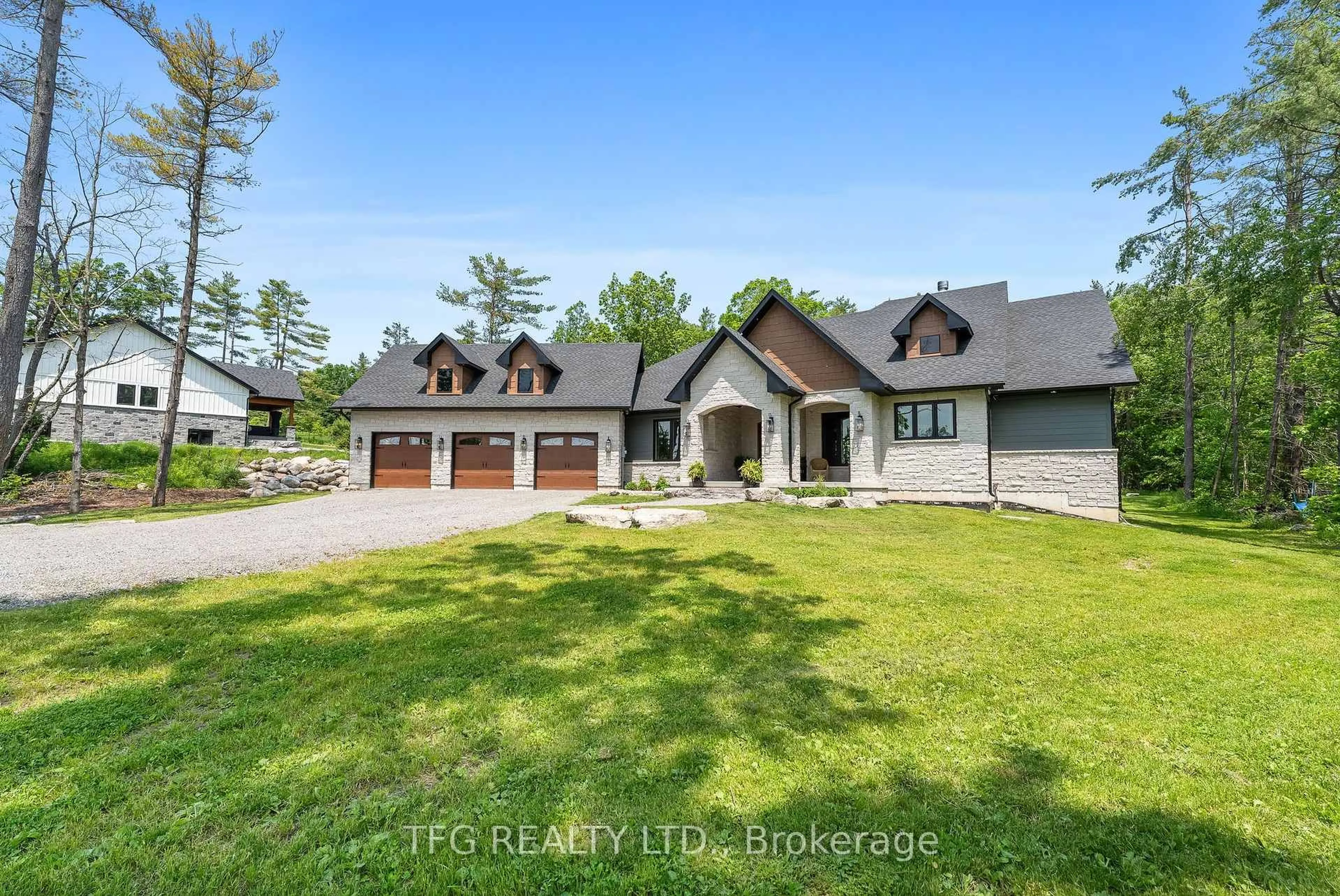 A pic from outside/outdoor area/front of a property/back of a property/a pic from drone, unknown for 55 Fire Route 70 Rte, Trent Lakes Ontario K0L 1R0