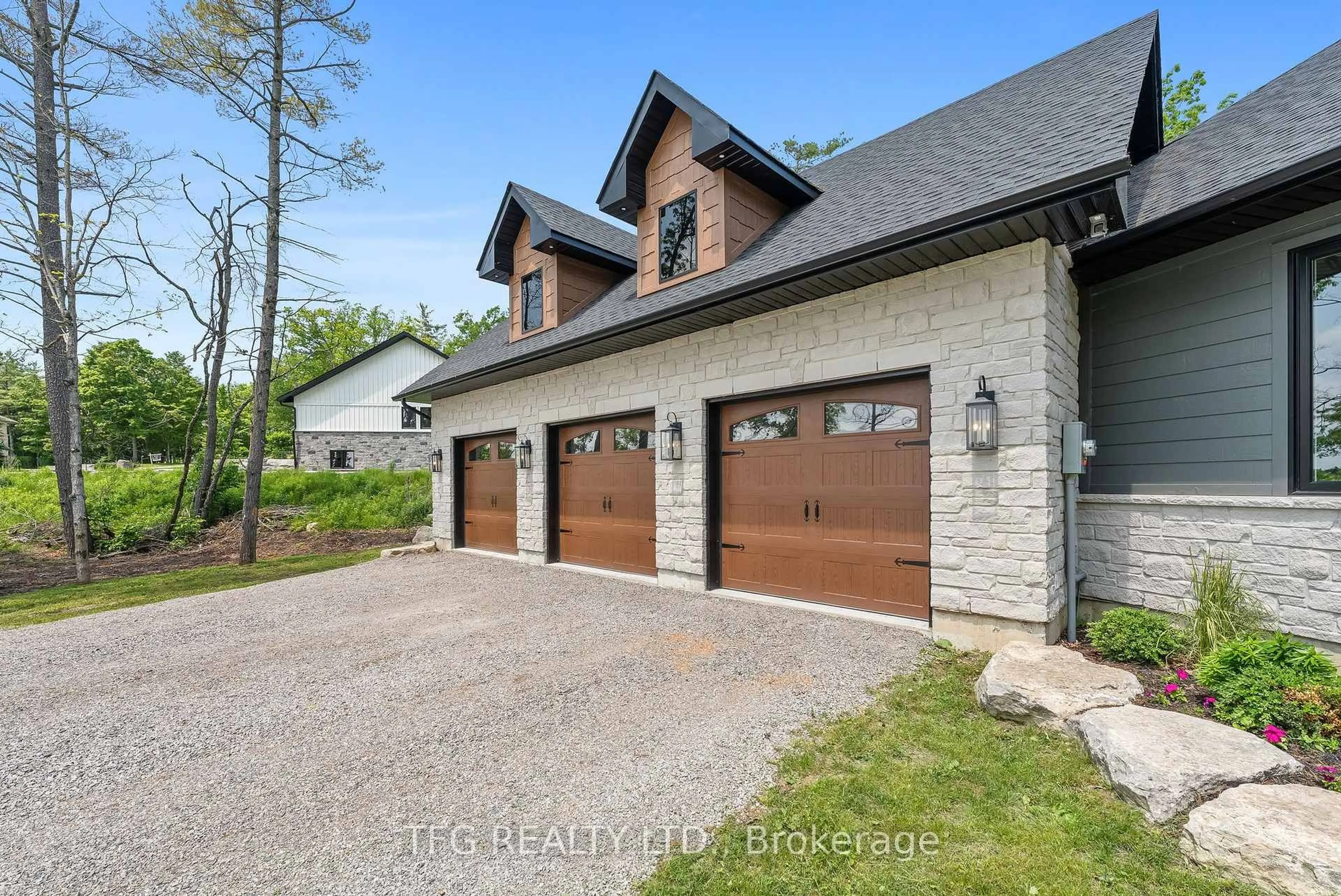Home with brick exterior material, street for 55 Fire Route 70 Rte, Trent Lakes Ontario K0L 1R0