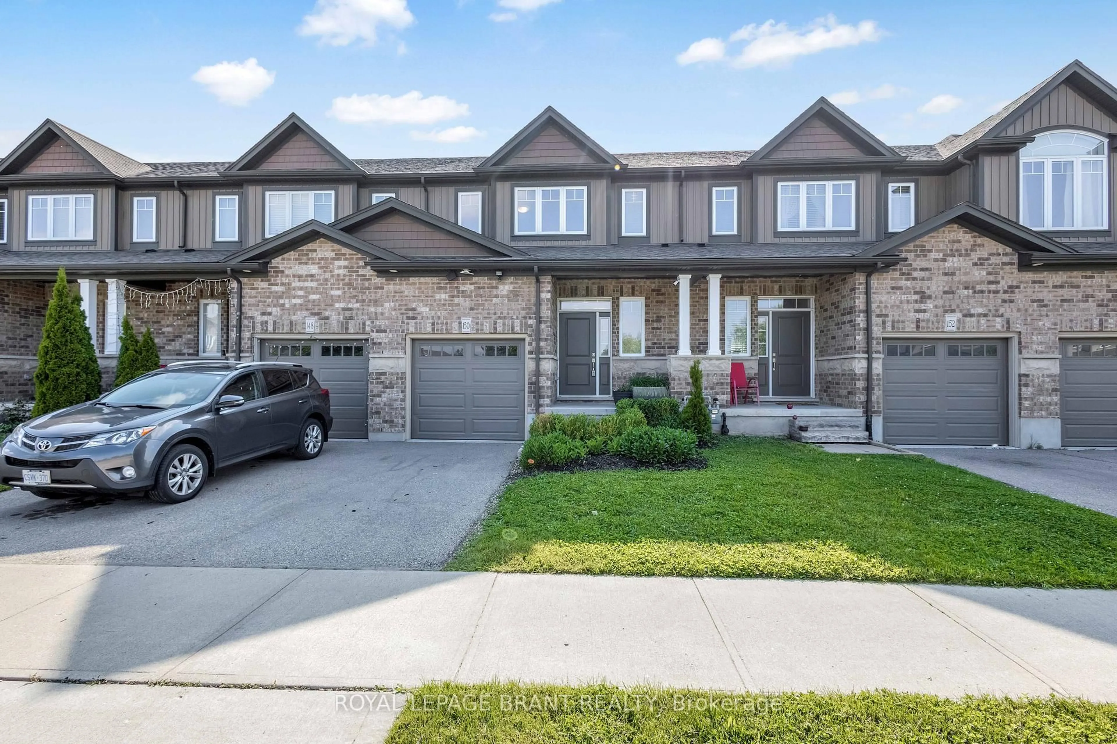 Home with brick exterior material, street for 150 Templewood Dr, Kitchener Ontario N2R 0H5